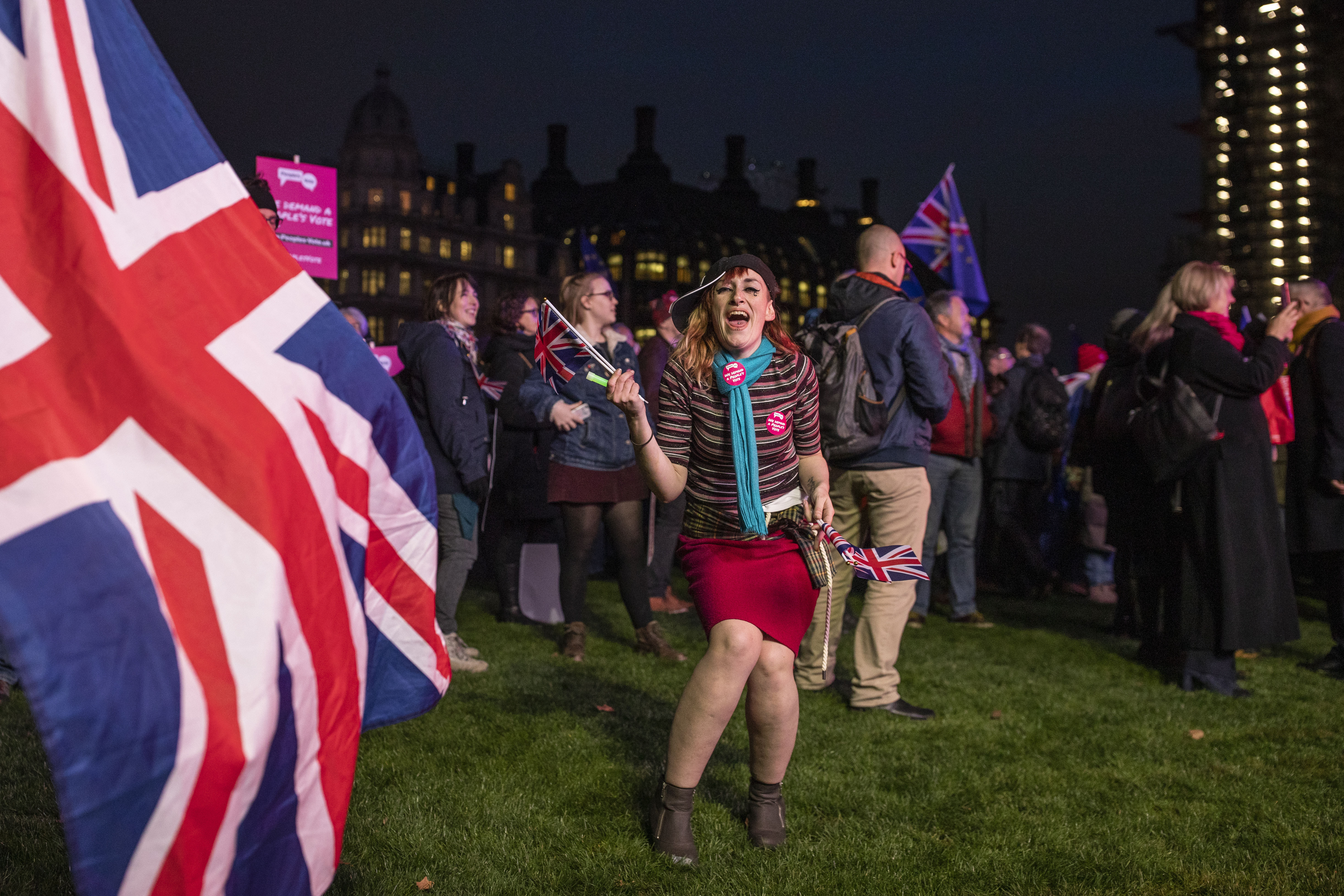 'People's Vote' supporters dance and listen to speeches during a demonstration in Parliament Square on January 15, 2019 in London, England. (Photo by Dan Kitwood/Getty Images)