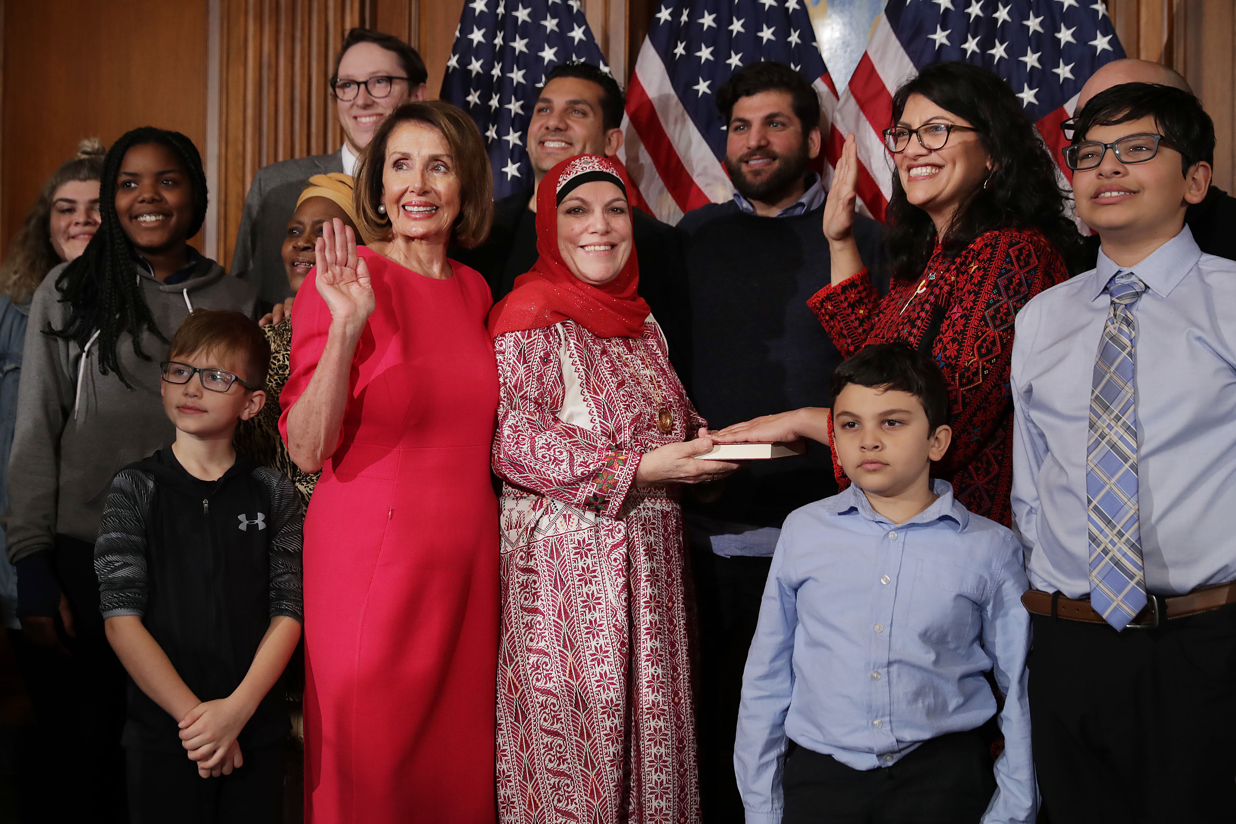 Speaker of the House Nancy Pelosi poses for photographs with Rep. Rashida Tlaib and her family in the Rayburn Room at the U.S. Capitol January 03, 2019 in Washington, DC. (Photo by Chip Somodevilla/Getty Images)