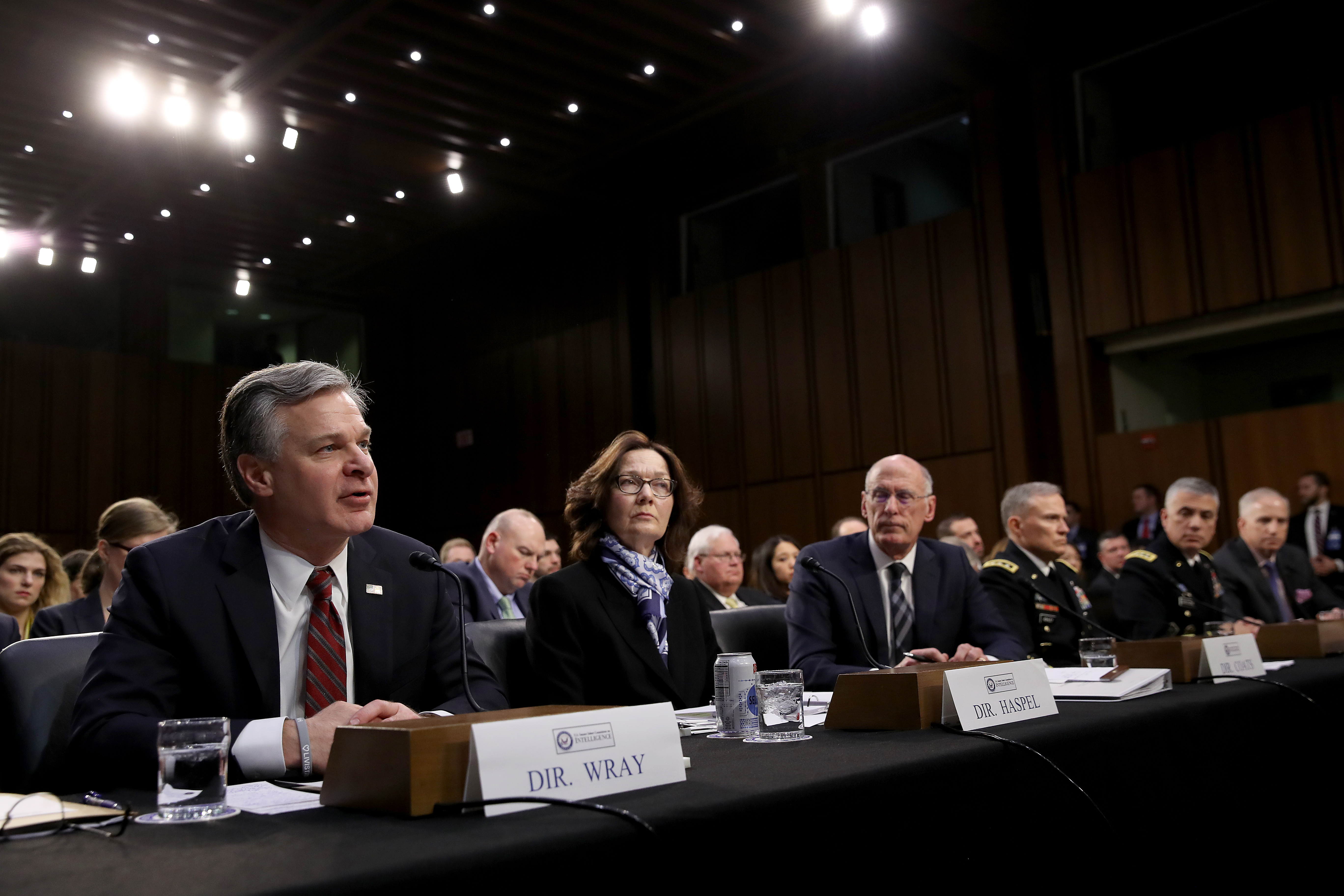 (L-R) FBI Director Christopher Wray; CIA Director Gina Haspel; Director of National Intelligence Dan Coats; Gen. Robert Ashley, director of the Defense Intelligence Agency; Gen. Paul Nakasone, director of the National Security Agency; and Robert Cardillo, director of the National Geospatial-Intelligence Agency await testify at a Senate Intelligence Committee hearing on "Worldwide Threats" January 29, 2019 in Washington, DC. (Photo by Win McNamee/Getty Images)