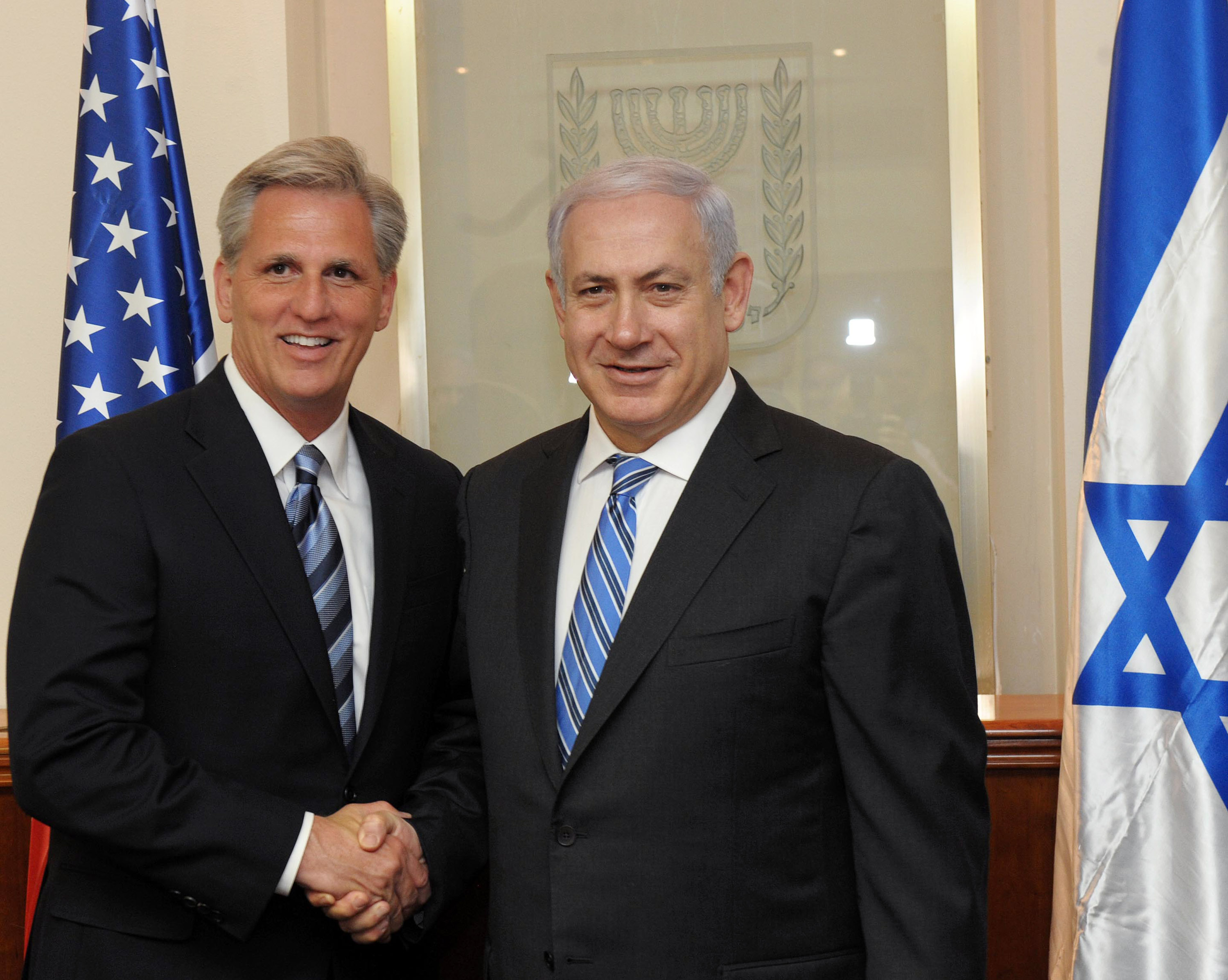 JERUSALEM, ISRAEL - AUGUST 15: (ISRAEL OUT) In this handout image provided by the Israeli Government Press Office (GPO), Israeli Prime Minister Benjamin Netanyahu shakes hands with US Congressman Kevin McCarthy (L) at the Prime Minister's office on August 15, 2011 in Jerusalem, Israel. (Avi Ohayon/GPO via Getty Images)