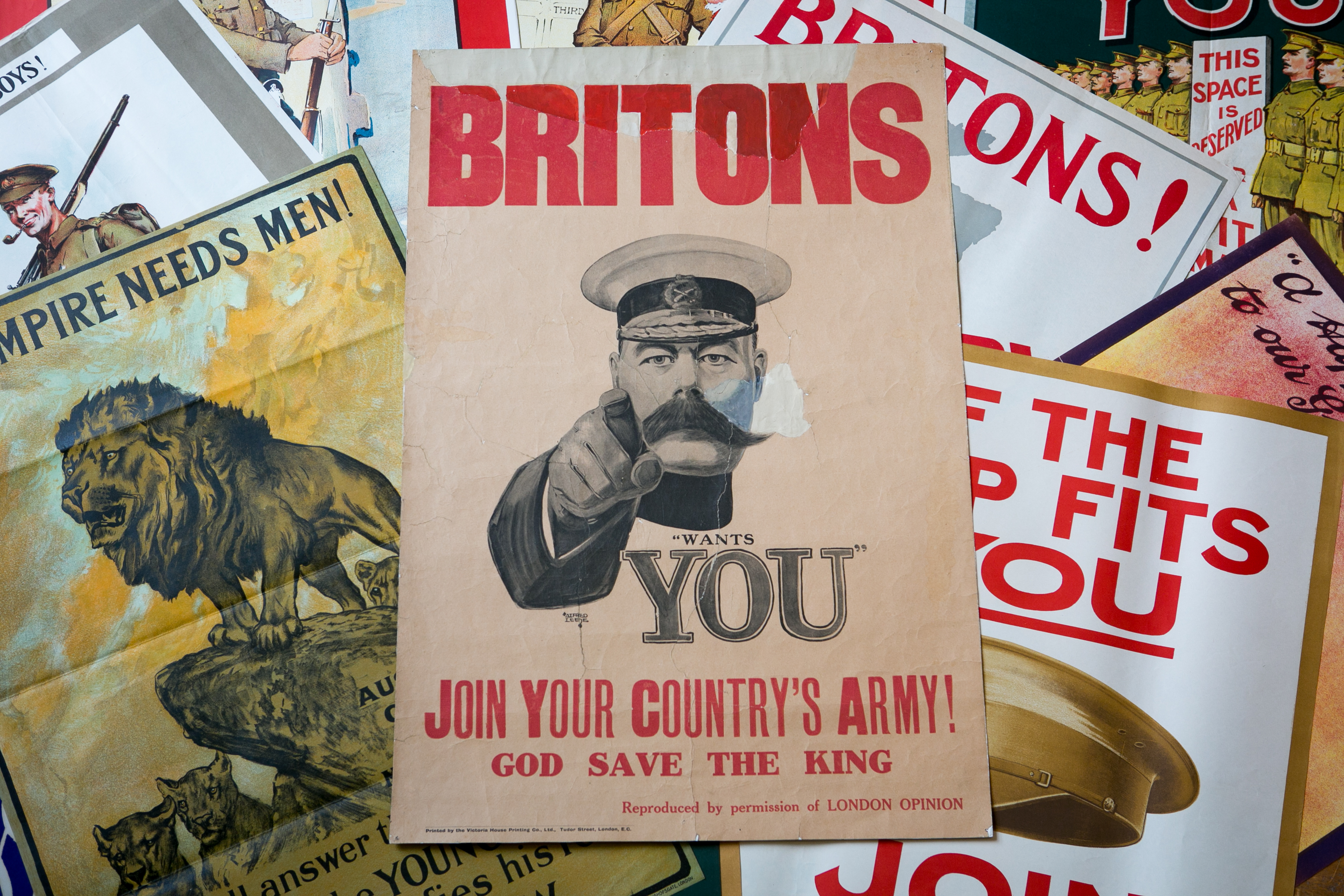 First World War recruitment posters including the Alfred Leete's Lord Kitchener's "Wants You" original recruiting poster from 1914 that is estimated at £10000 - £15000 and that are being sold tomorrow in the Onslows Auctioneers, The Great War Centenary and Summer Vintage Posters Auction are seen, on July 8, 2014 in Blandford Forum, England. (Photo by Matt Cardy/Getty Images)