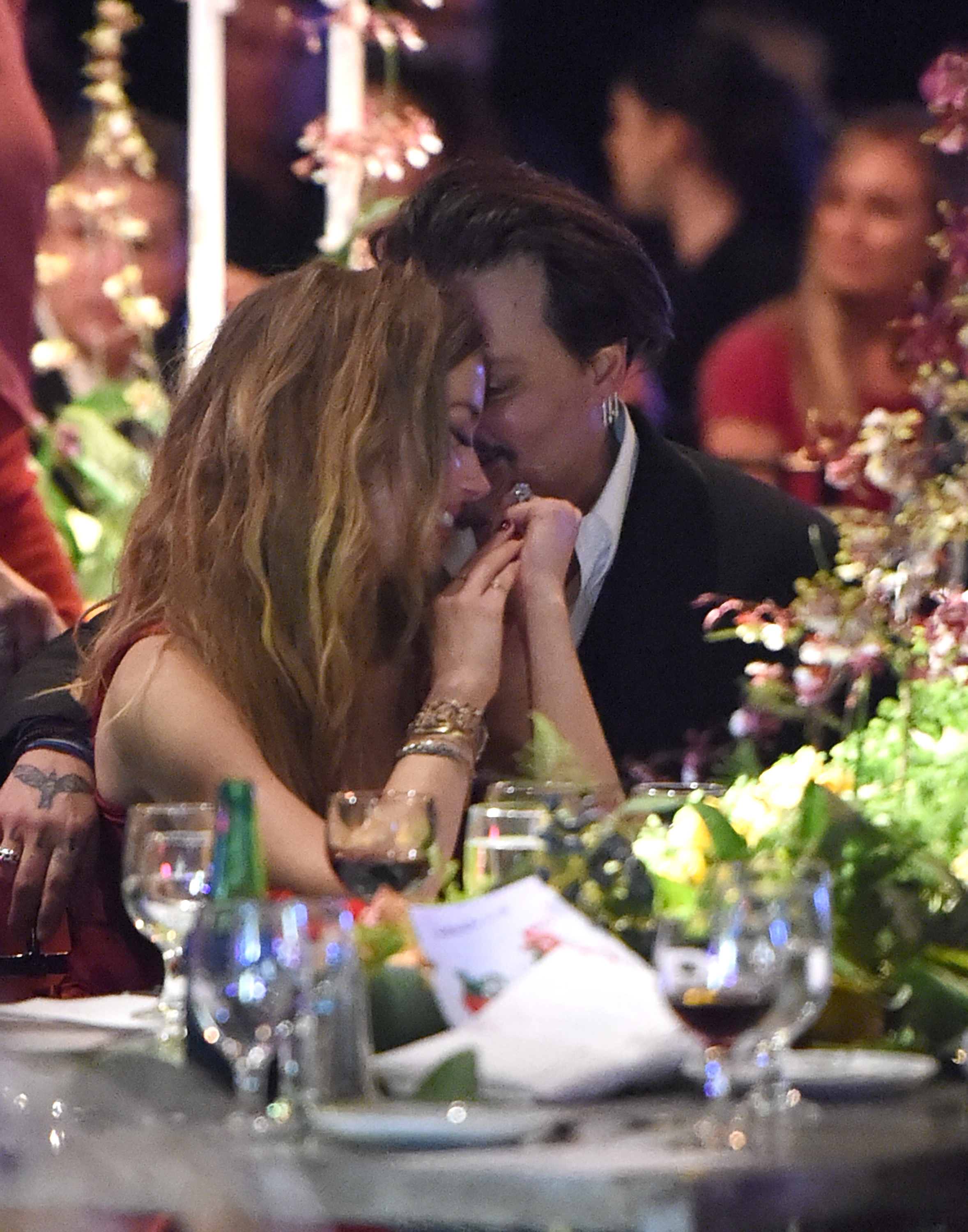 Actors Amber Heard and Johnny Depp attend The Art of Elysium 2016 HEAVEN Gala presented by Vivienne Westwood and Andreas Kronthaler at 3LABS on January 9, 2016 in Culver City, California. (Photo by Jason Merritt/Getty Images for Art of Elysium)