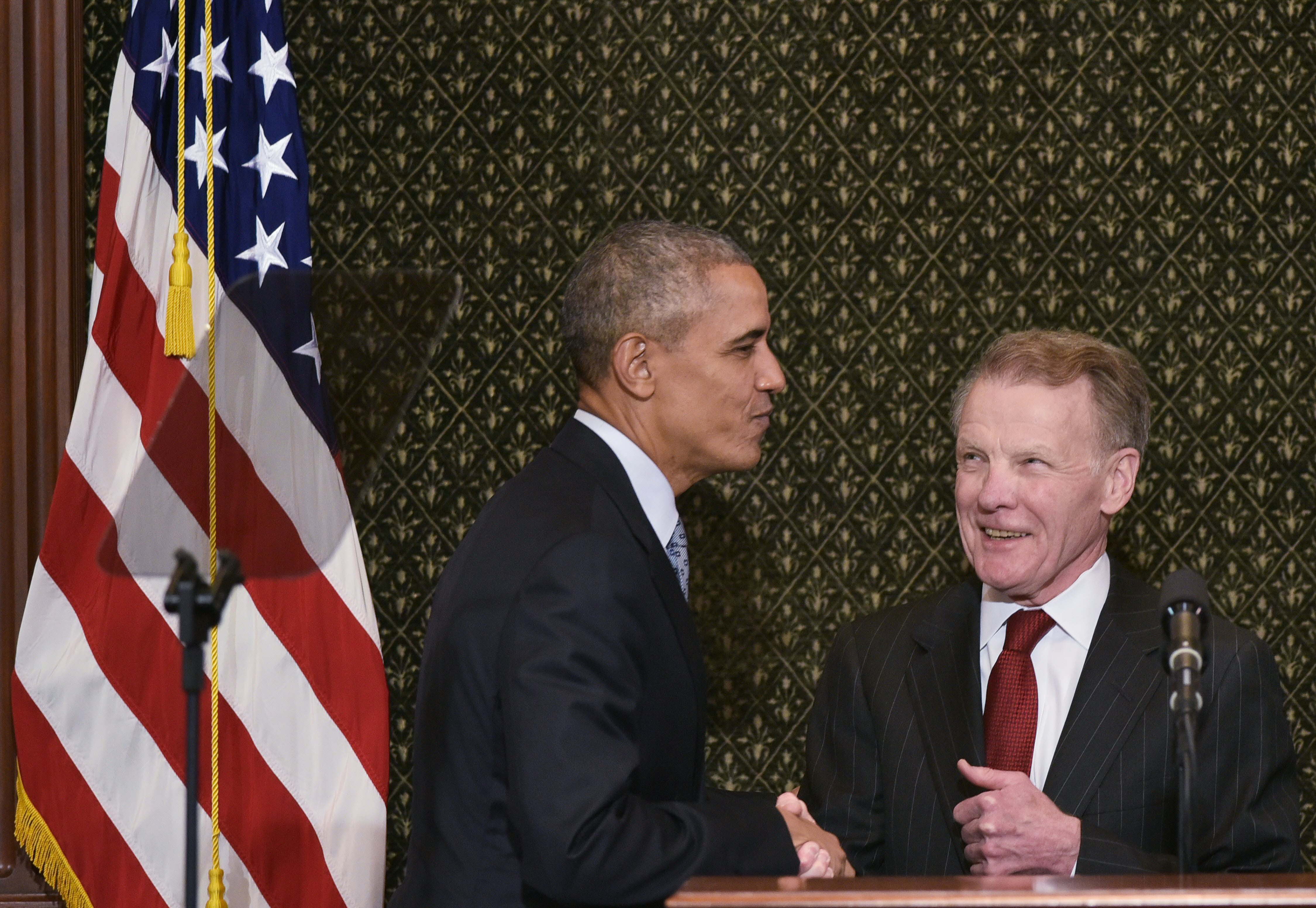US President Barack Obama shakes hands with Illinois House Speaker Michael Madigan as he arrives to address the Illinois General Assembly at the Illinois State Capitol in Springfield, Illinois on February 10, 2016. (MANDEL NGAN/AFP/Getty Images)