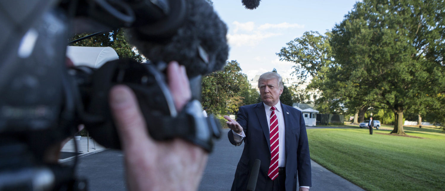 During the exchange, President Trump called NBC News, "Fake News" after the news agency reported tension between Trump and US Secretary of State Rex Rex Tillerson. The President will travel to Greensboro, North Carolina this evening to participate in a roundtable discussion with Republican National Committee members. (PHOTO: ALEX EDELMAN/AFP/Getty Images)