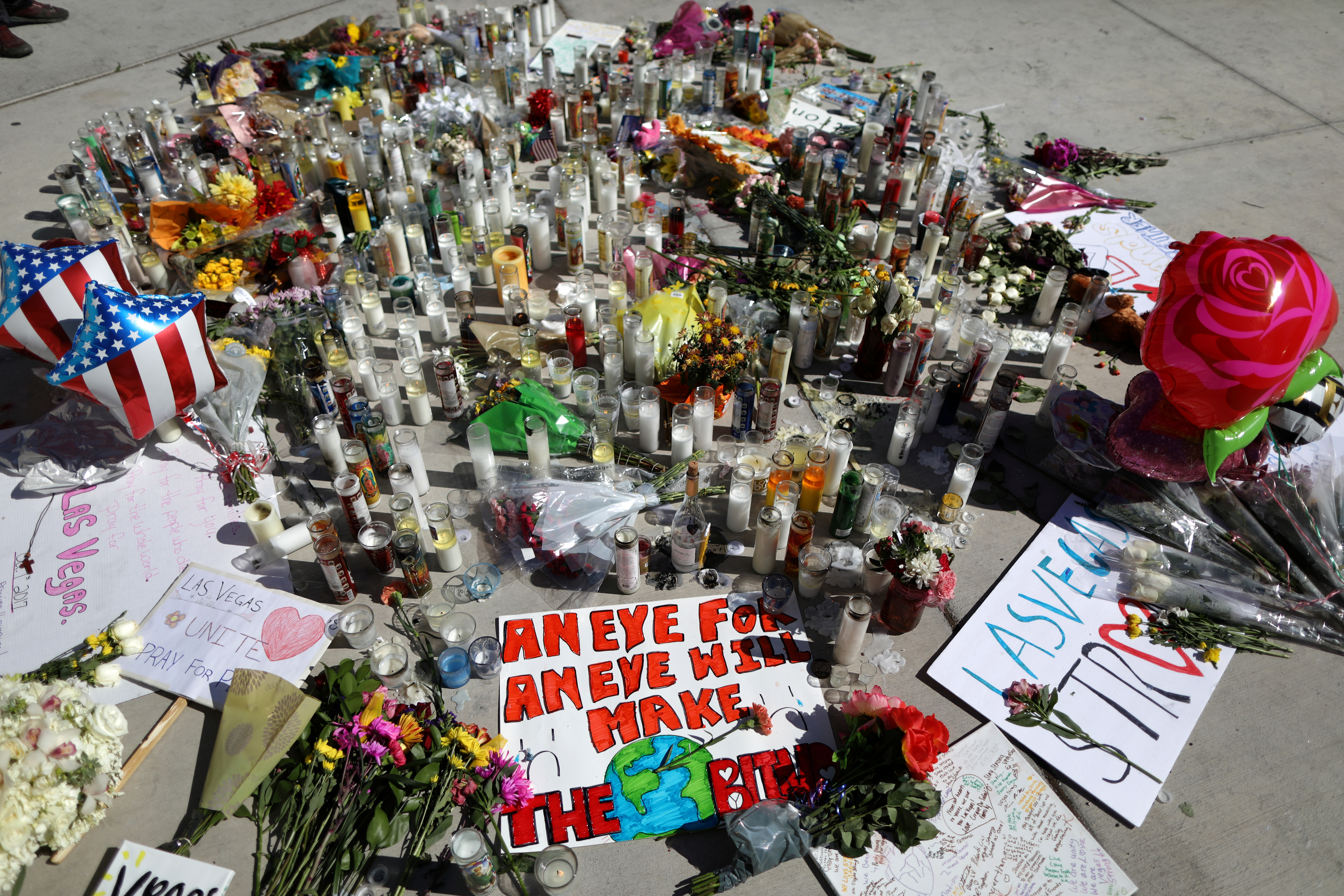 A makeshift memorial is seen on the Las Vegas Strip for victims of the Route 91 music festival mass shooting next to the Mandalay Bay Resort and Casino in Las Vegas, Nevada, U.S. October 3, 2017. REUTERS/Lucy Nicholson
