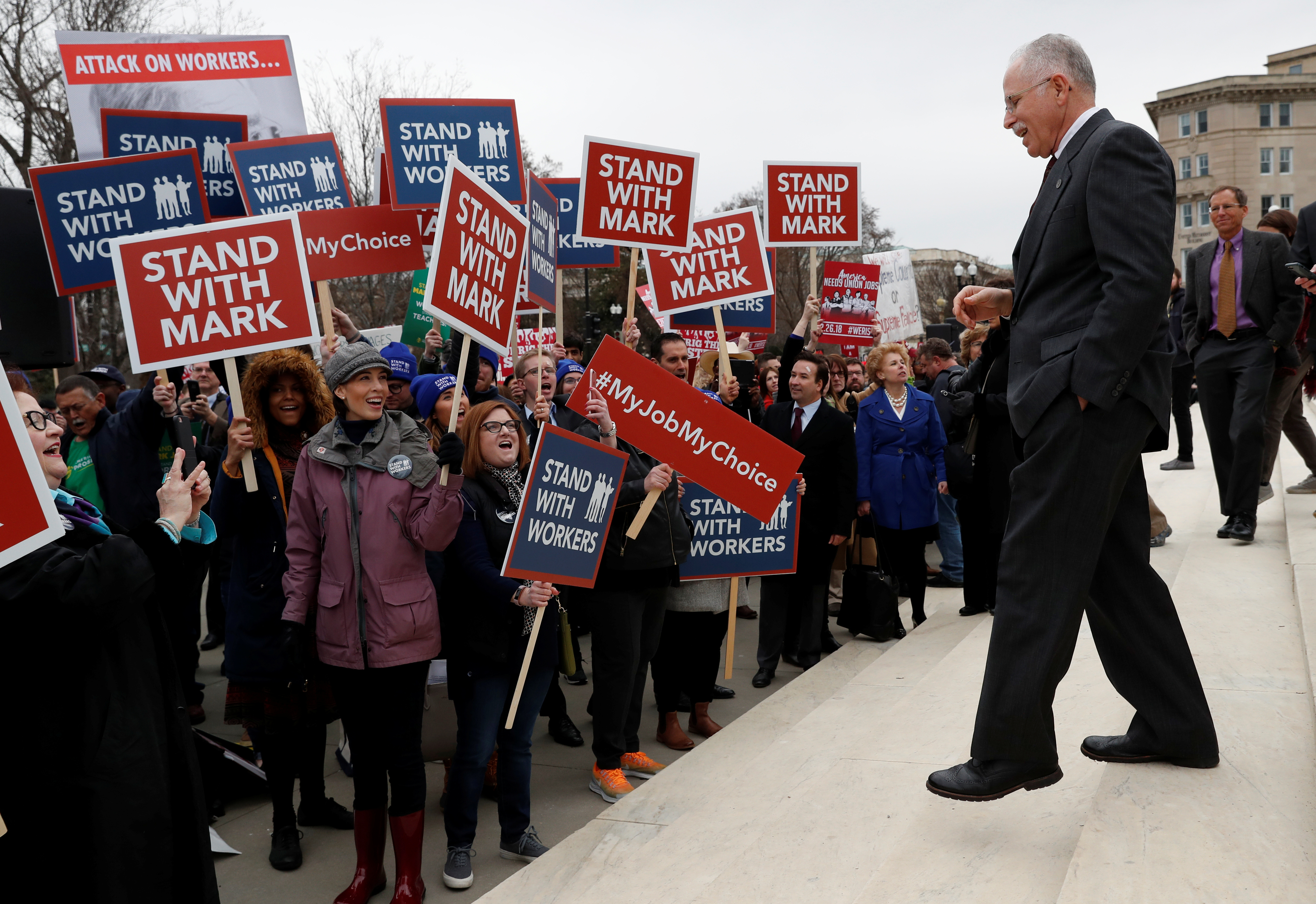 Mark Janus is cheered by supporters outside of the United States Supreme Court in Washington, U.S., February 26, 2018. REUTERS/Leah Millis