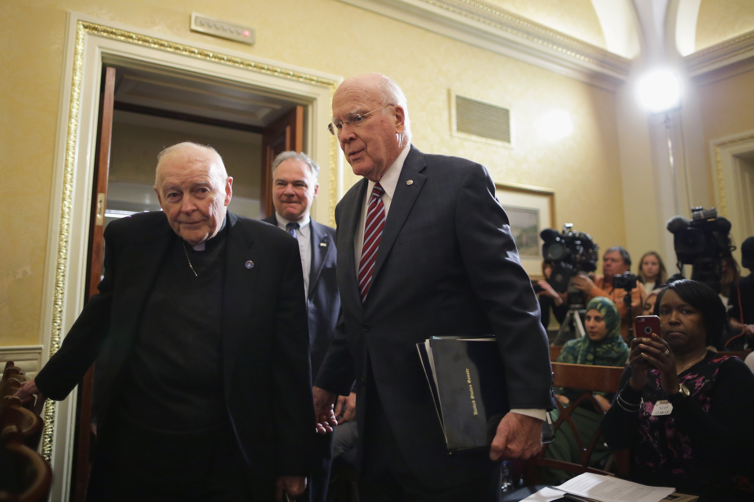 WASHINGTON, DC - DECEMBER 08: Sen. Patrick Leahy (D-VT) (R) and Cardinal Theodore McCarrick arrive for a news conference with national religious leaders to respond to attempts at vilifying refugees and call on lawmakers to engage in policymaking and not 'fear-mongering' at the U.S. Capitol December 8, 2015 in Washington, DC. (Photo by Chip Somodevilla/Getty Images)