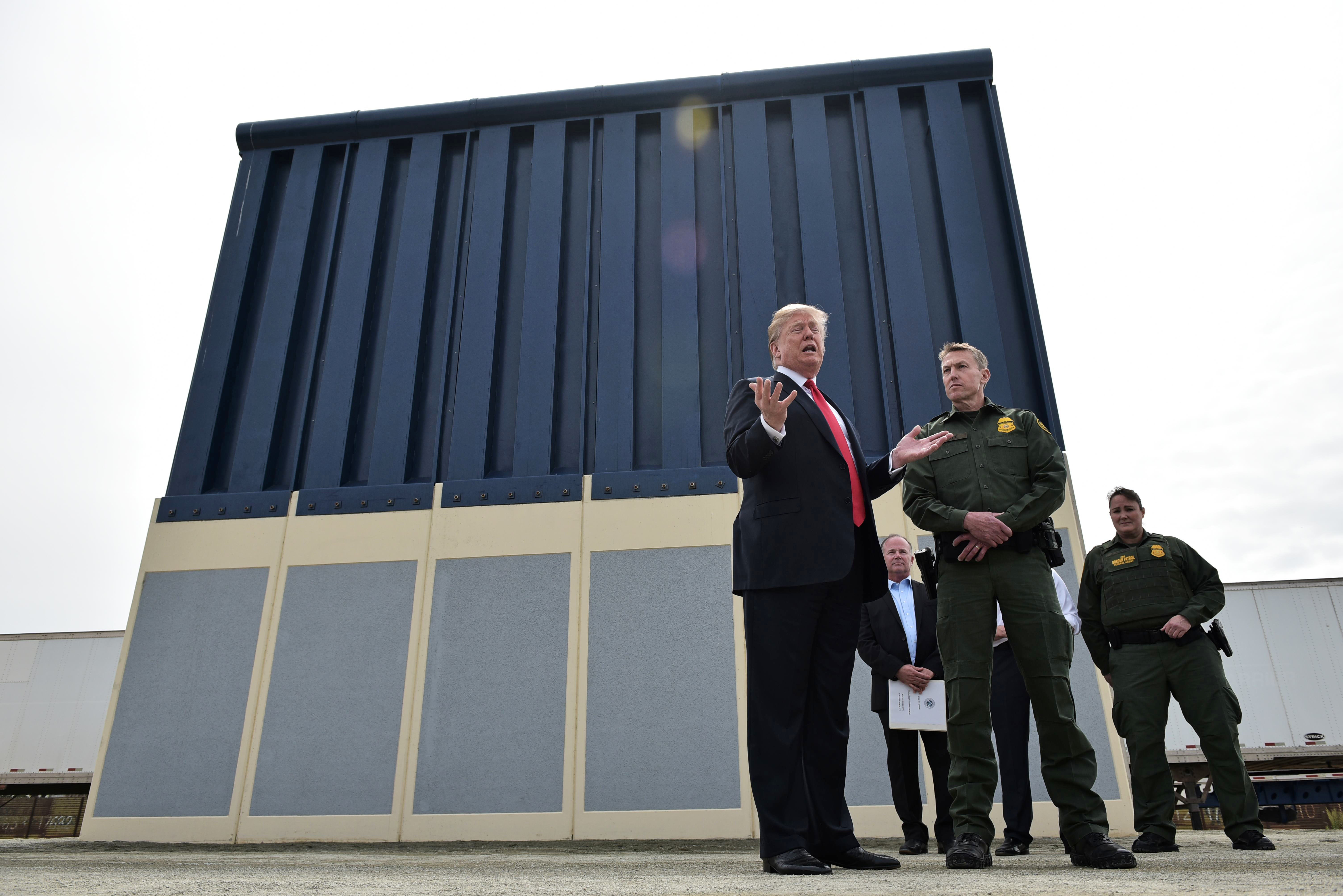 US President Donald Trump speaks as he inspects border wall prototypes in San Diego, California on March 13, 2018. MANDEL NGAN/AFP/Getty Images 