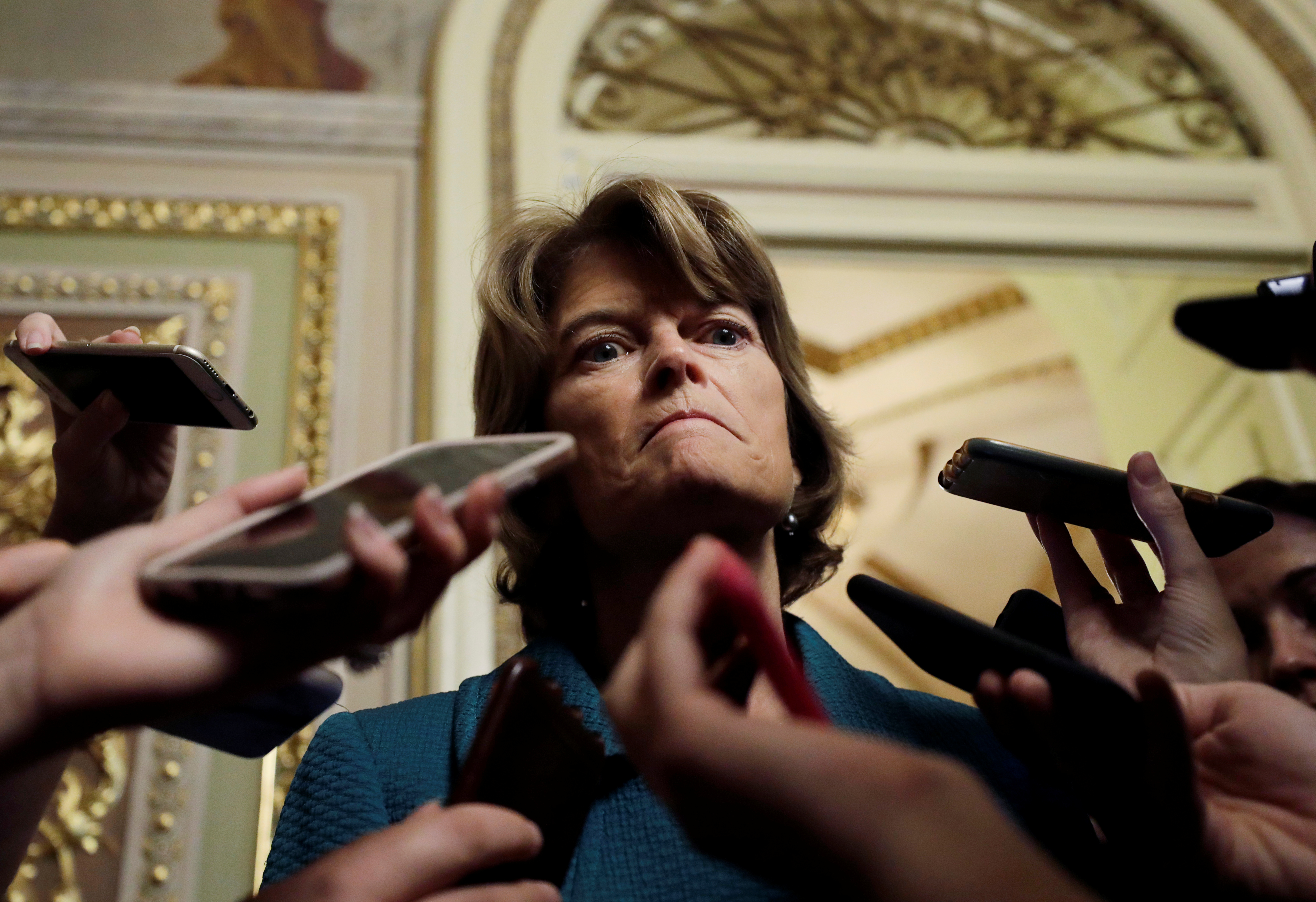 U.S. Senator Murkowski talks to reporters about her no vote on Kavanaugh nomination vote on Capitol Hill in Washington