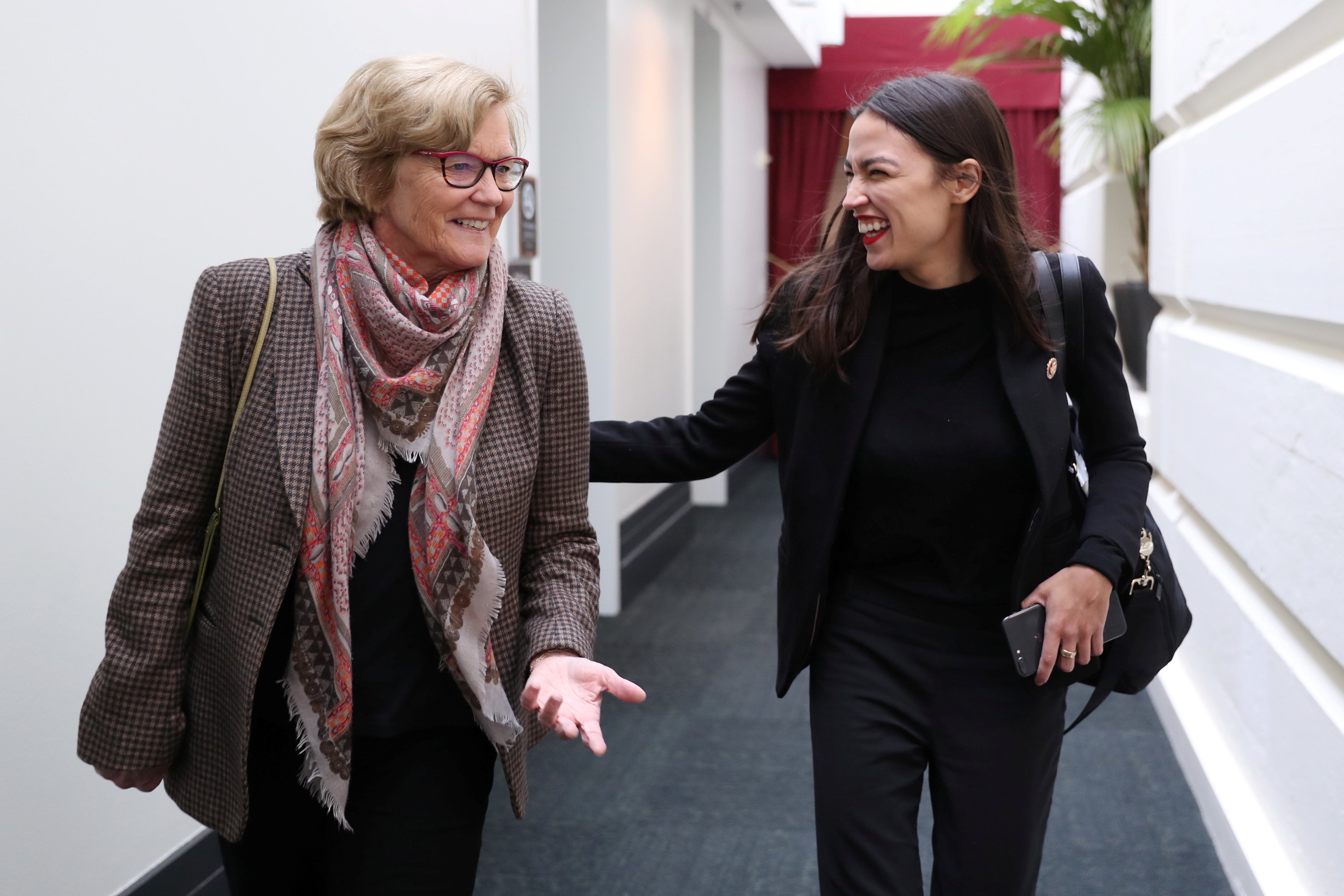 U.S. Representative Pingree and Representative Ocasio-Cortez arrive for a House Democratic party caucus meeting at the U.S. Capitol in Washington