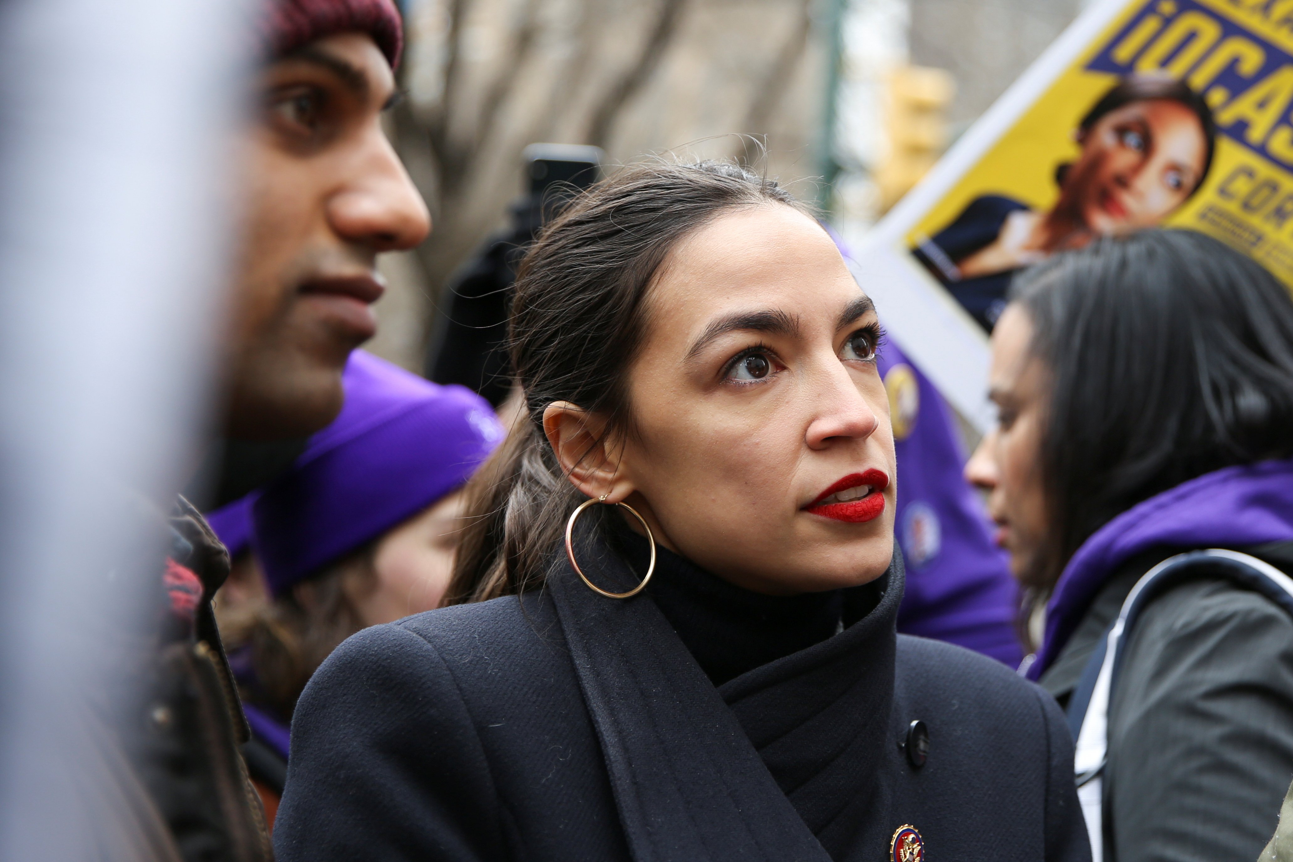 Rep. Alexandria Ocasio-Cortez speaks during a march organised by the Women's March Alliance in the Manhattan borough of New York City