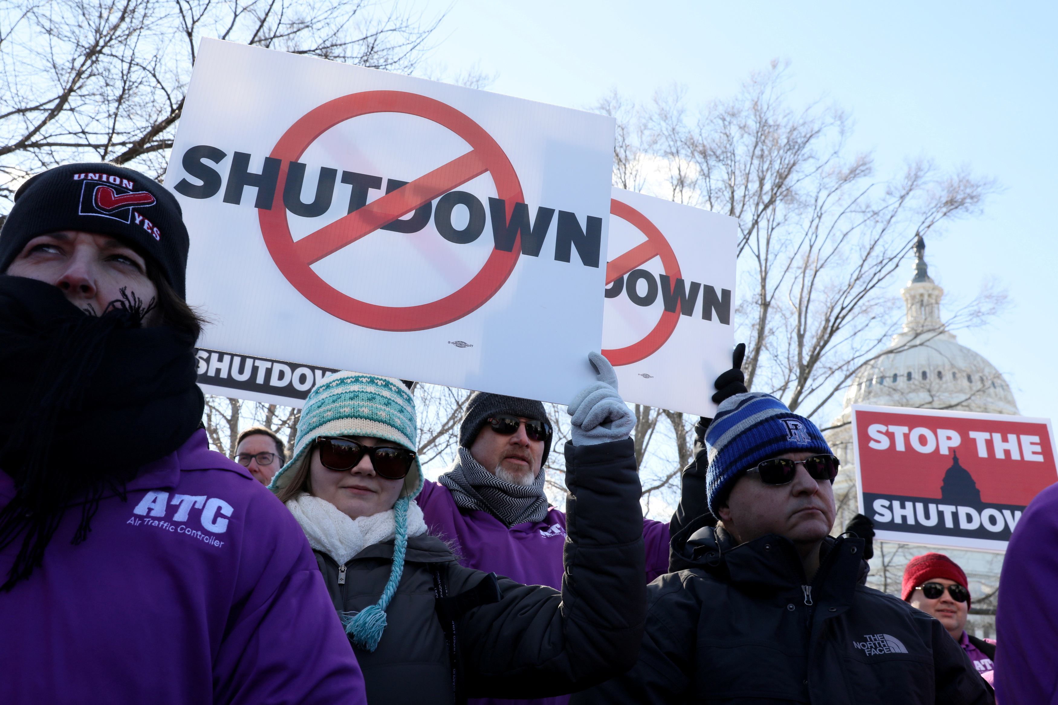 Federal air traffic controller union members protest the partial U.S. federal government shutdown in a rally at the U.S. Capitol in Washington, U.S. Jan. 10, 2019. REUTERS/Jonathan Ernst