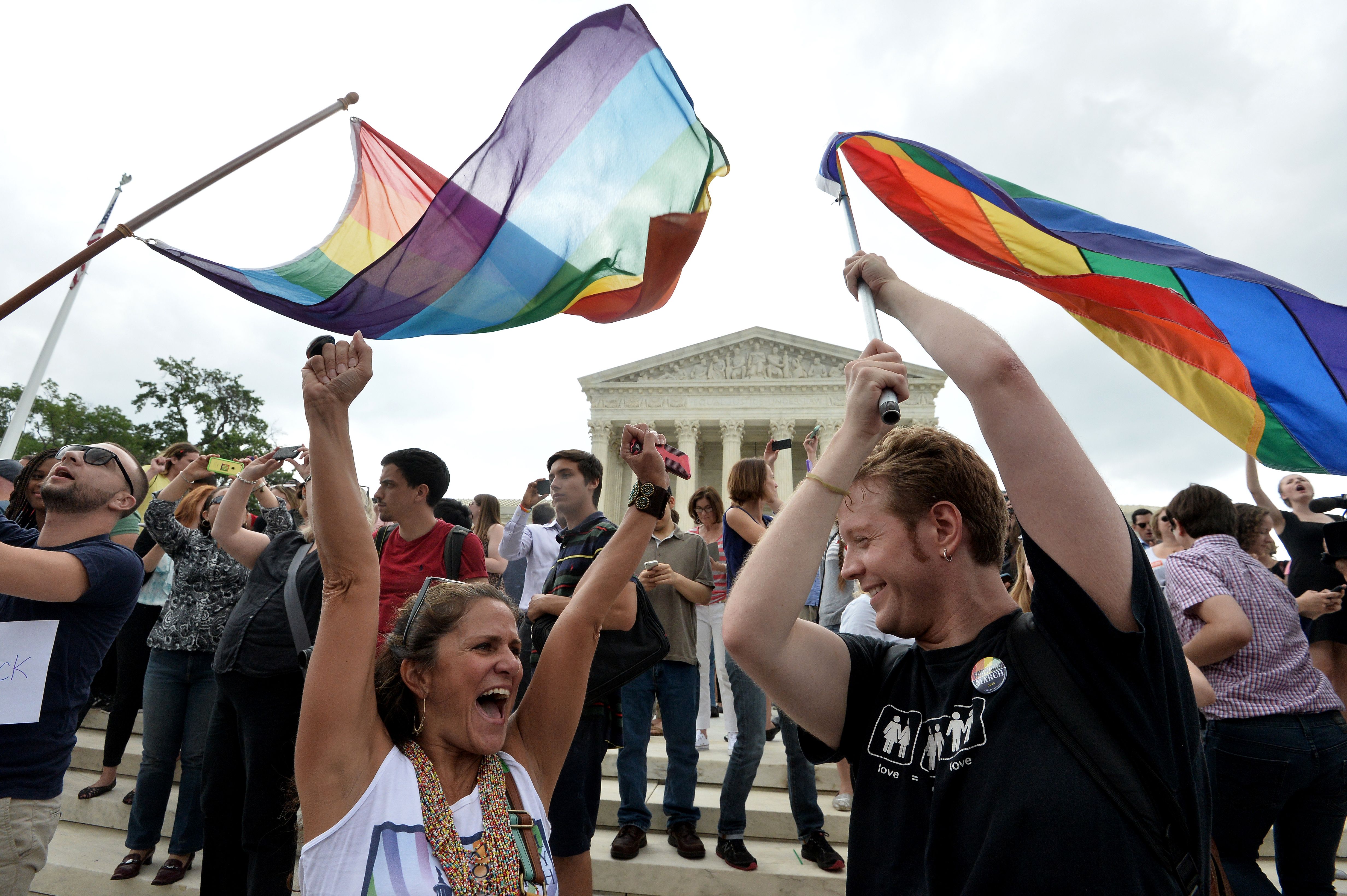 People celebrate outside the Supreme Court in Washington, DC on June 26, 2015 after its historic decision on gay marriage. (Mladen Antonov/AFP/Getty Images)
