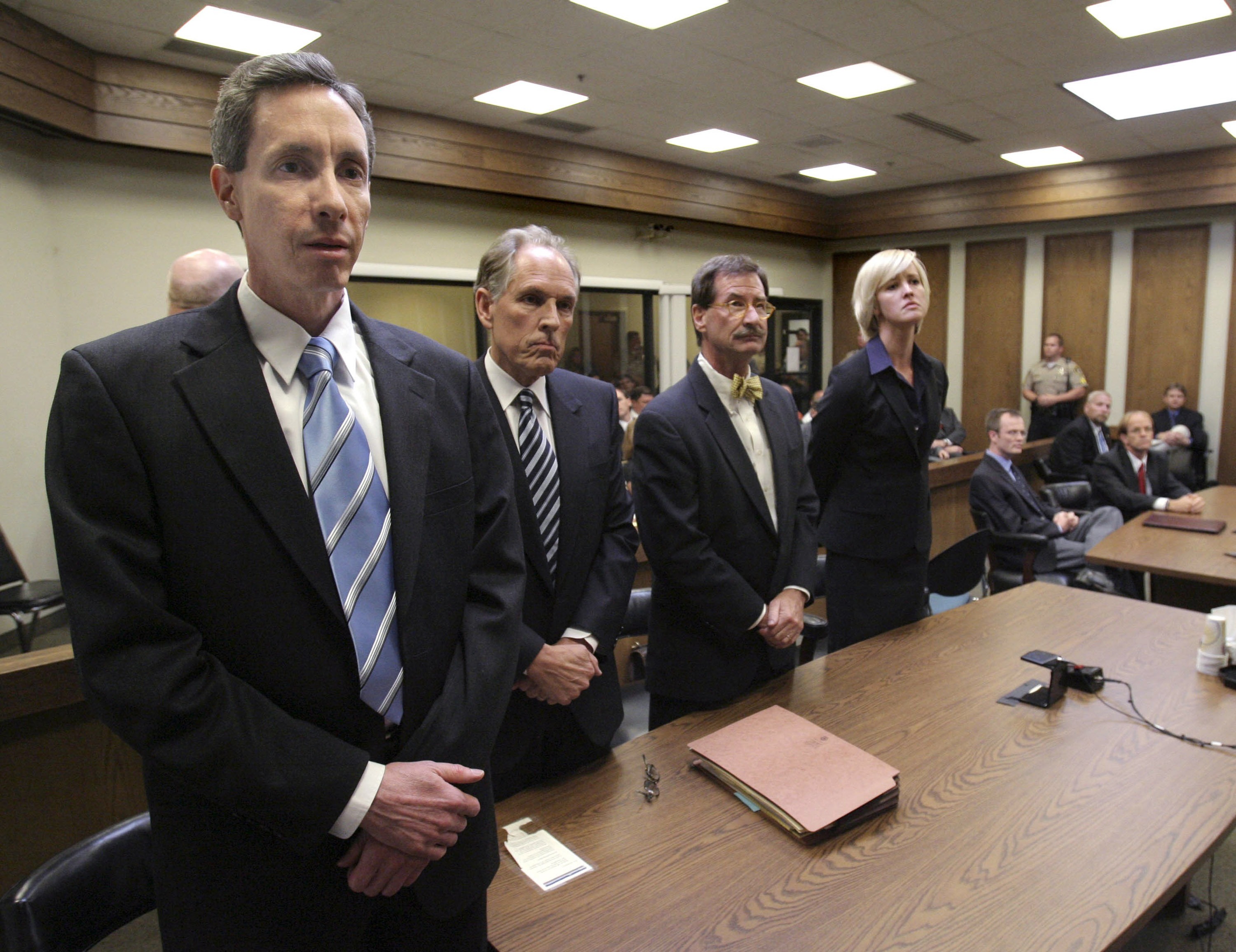 ST. GEORGE, UT - SEPTEMBER 25: Warren Jeffs (L) and his council reacts to the the guilty verdicts rendered in his trial September 25, 2007 in St. George, Utah. Jeffs, an accused polygamist and head of the breakaway Mormon sect, the Fundamentalist Church of Jesus Christ of Latter Day Saints, was found guilty on the two counts of being an accomplice to rape, related to the alleged coercion in the marriage and rape of a 14-year-old and a 19-year-old in 2001. The jury is still in deliberations after a juror was excused and replaced by an alternate. (Photo by Douglas C. Pizac-Pool/Getty Images)