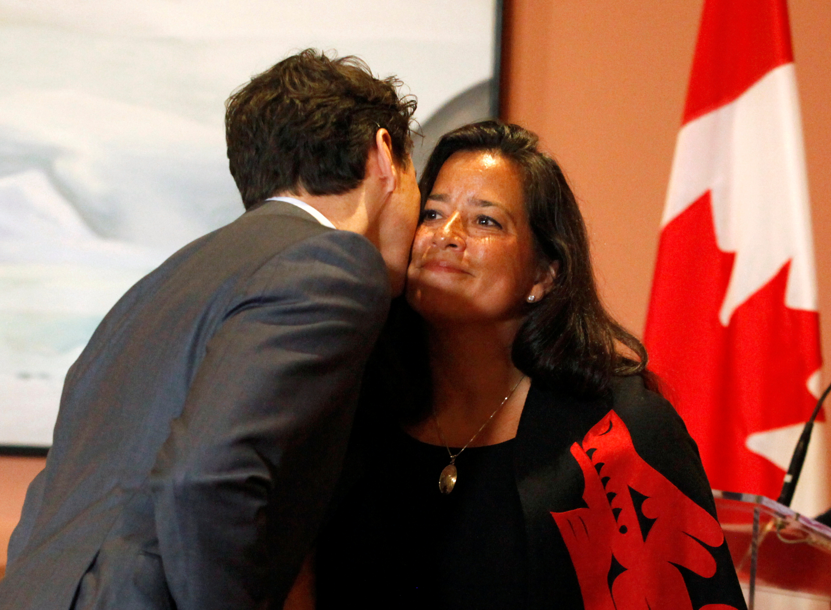 Newly appointed Canadian Veterans Affairs Minister Jody Wilson-Raybould is kissed by Prime Minister Justin Trudeau as he shuffles his cabinet after the surprise resignation of Treasury Board President Scott Brison, in Ottawa, Ontario, Canada, January 14, 2019. Picture taken January 14, 2019. REUTERS/Patrick Doyle