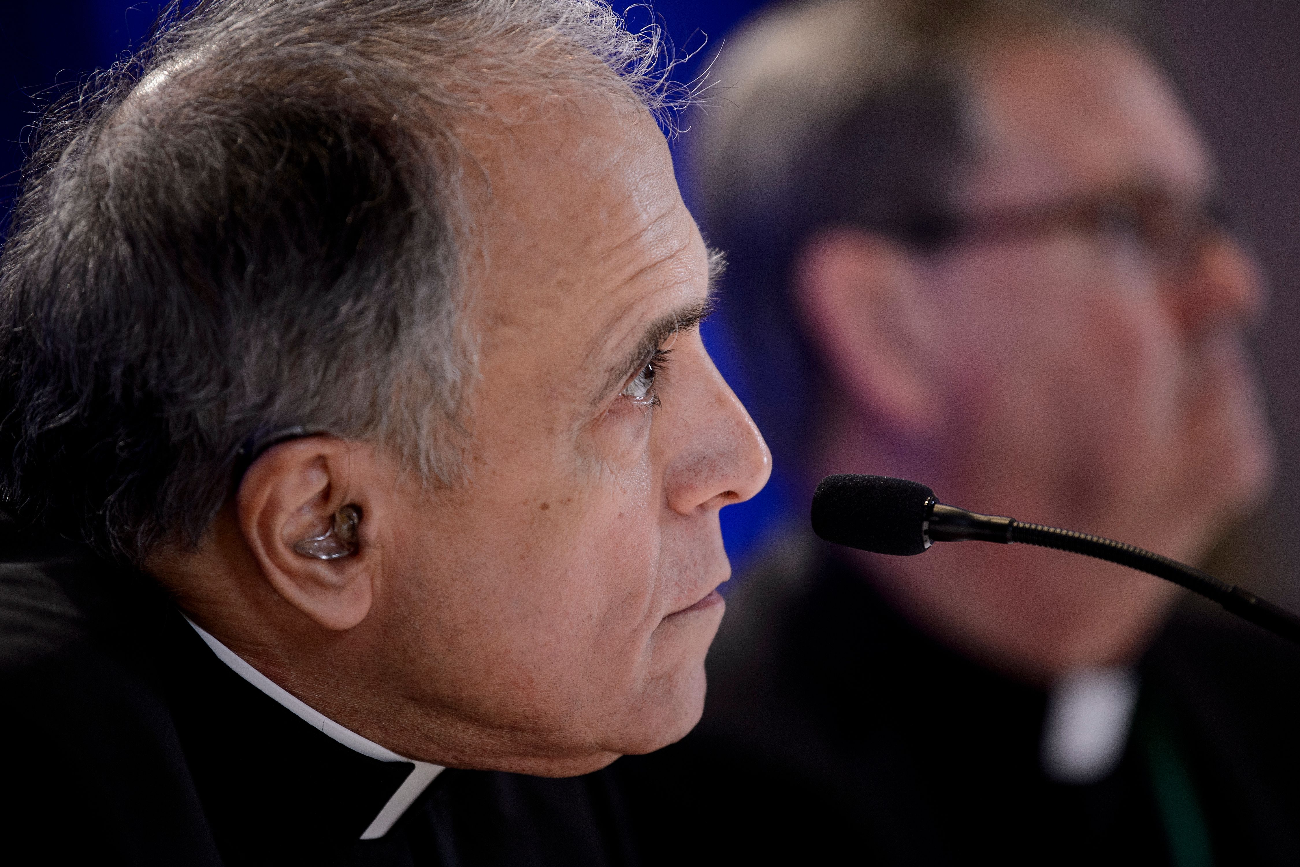 Galveston-Houston Cardinal Daniel DiNardo (L), President of the USCCB General Assembly, and Indiana Bishop Timothy Doherty, chairman of the committee for the Protection of Children and Young People, listen during a press conference at the annual US Conference of Catholic Bishops November 12, 2018 in Baltimore, Maryland. (BRENDAN SMIALOWSKI/AFP/Getty Images)