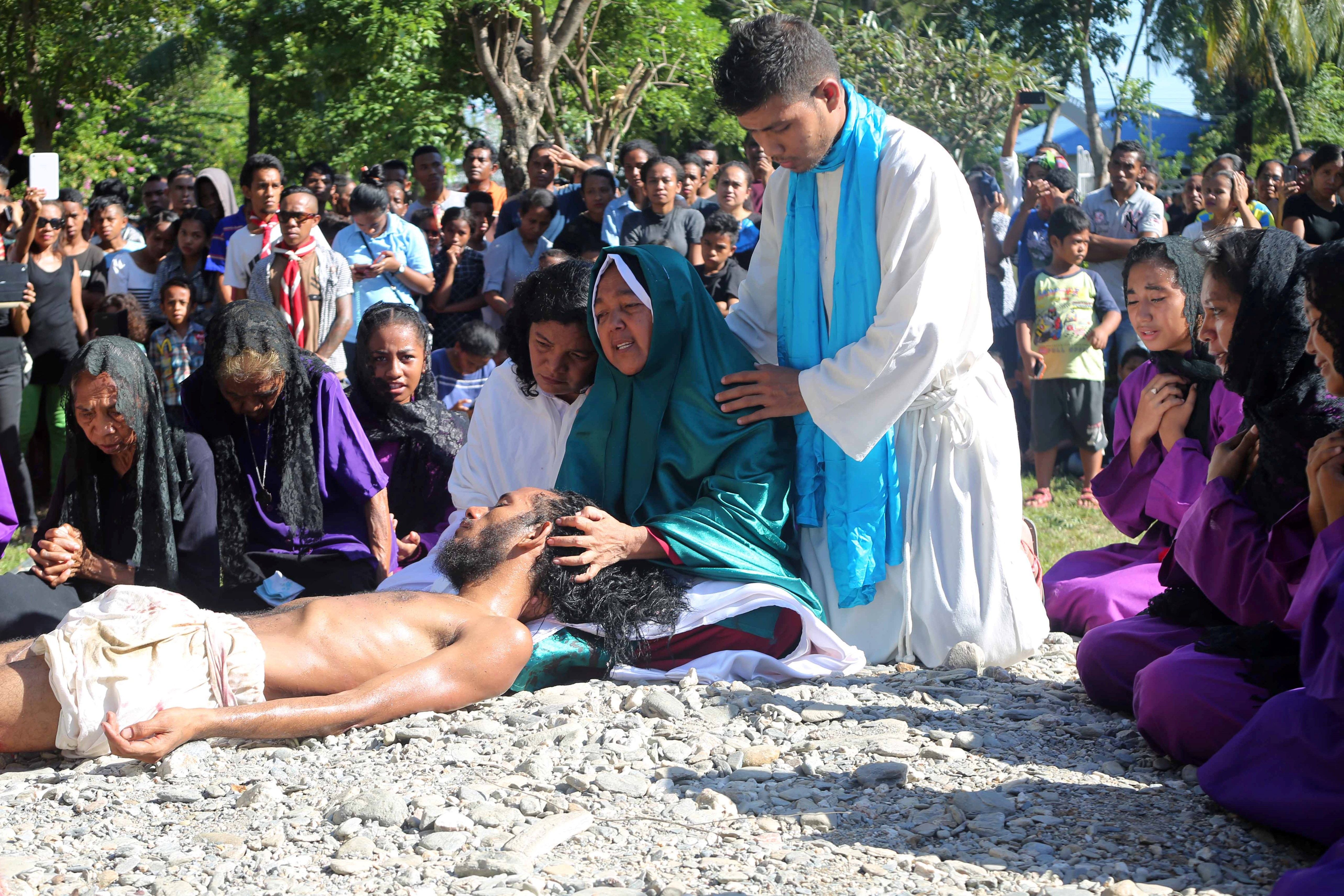East Timorese Christian devotees re-enact the crucifixion of Jesus Christ to commemorate Good Friday, ahead of Easter, in Dili on March 30, 2018. (VALENTINO DARIELL DE SOUSA/AFP/Getty Images)