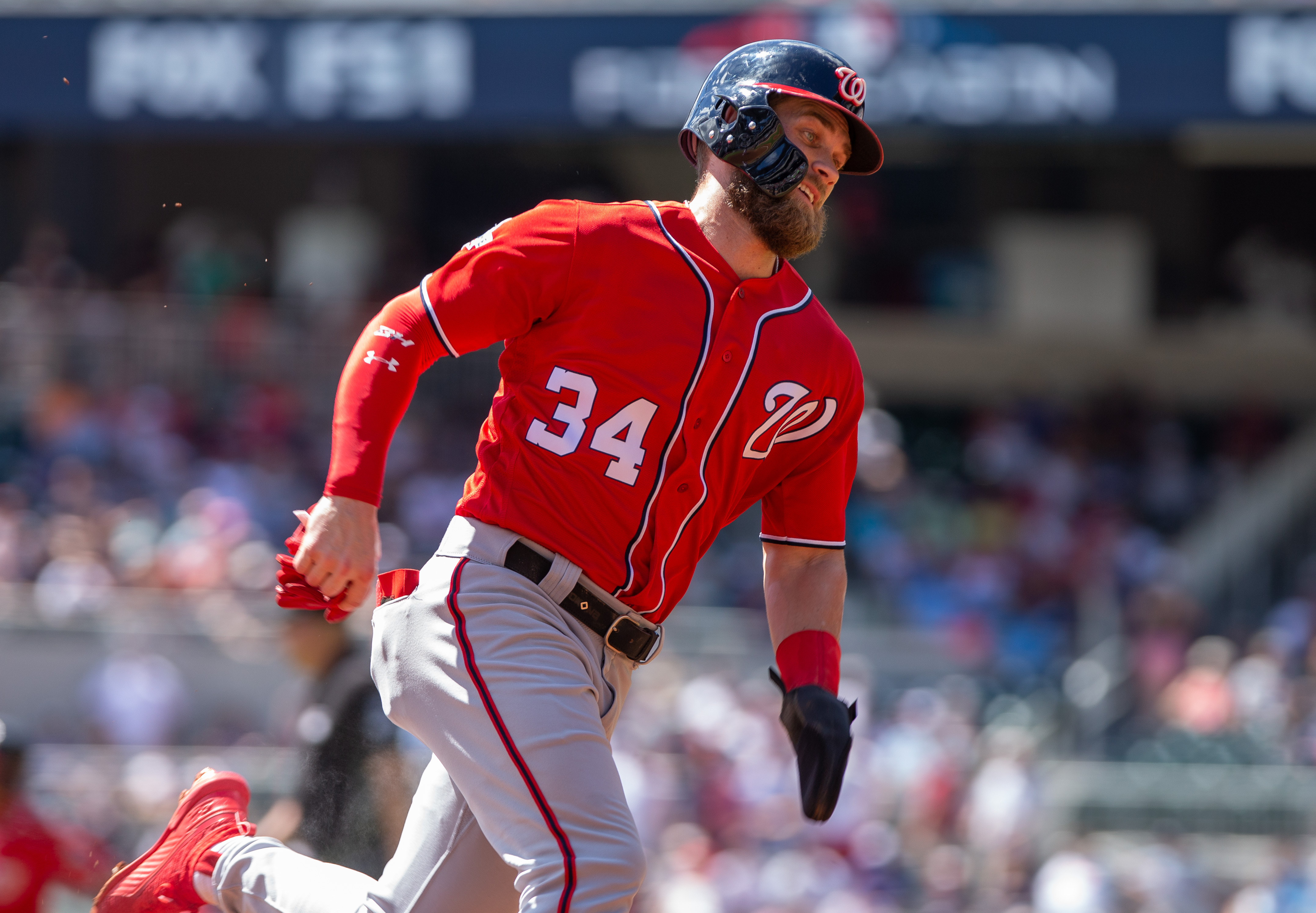 ATLANTA, GA - SEPTEMBER 15: Bryce Harper #34 of the Washington Nationals rounds third base and heads toward home as part of a 3 run 6th inning against the Atlanta Braves at SunTrust Park on September 15, 2018 in Atlanta, Georgia.(Photo by Kelly Kline/GettyImages)