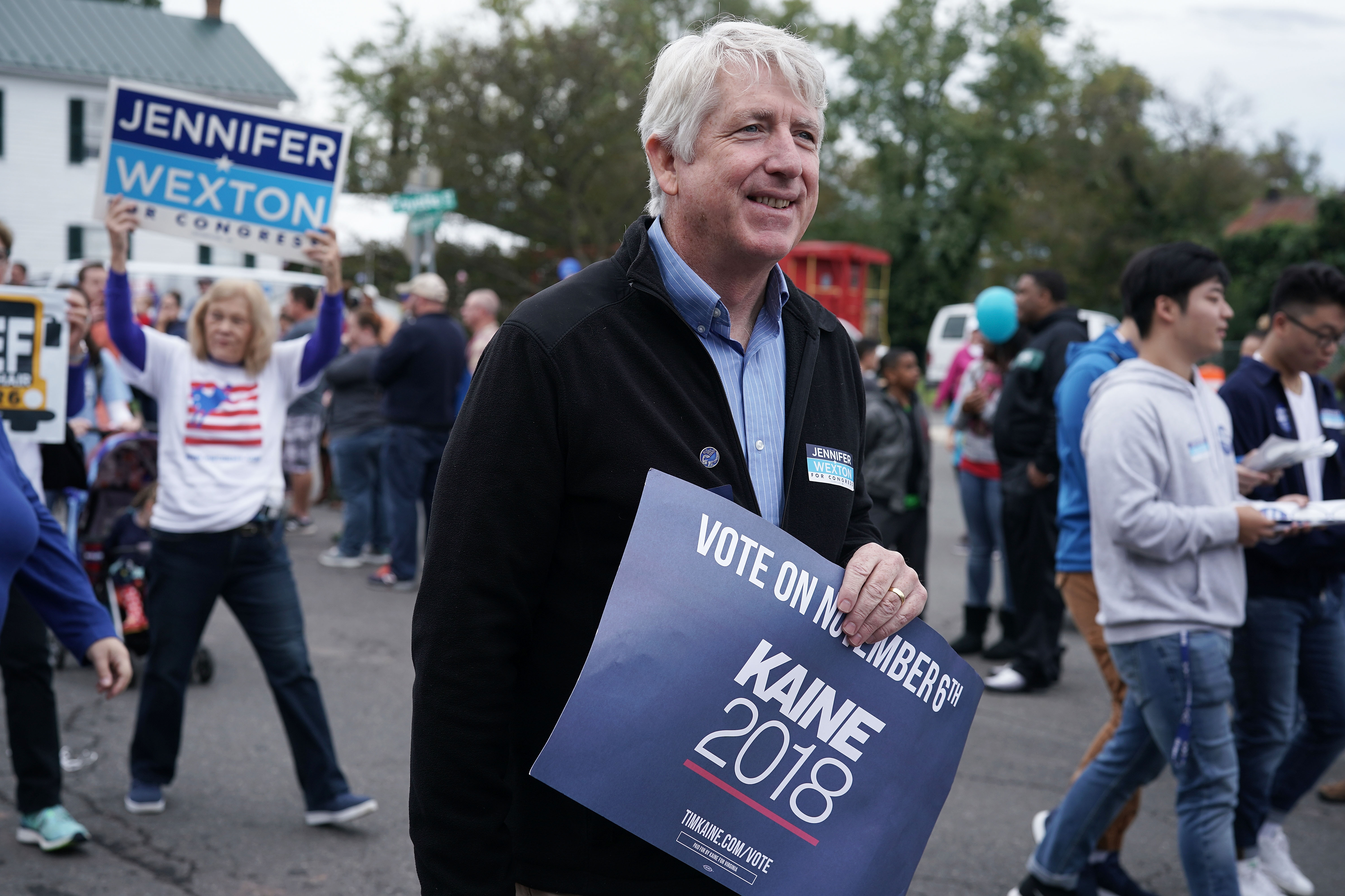 Virginia State Attorney General Mark Herring (C) participates in the annual Haymarket Day parade October 20, 2018 in Haymarket, Virginia. (Photo by Alex Wong/Getty Images)