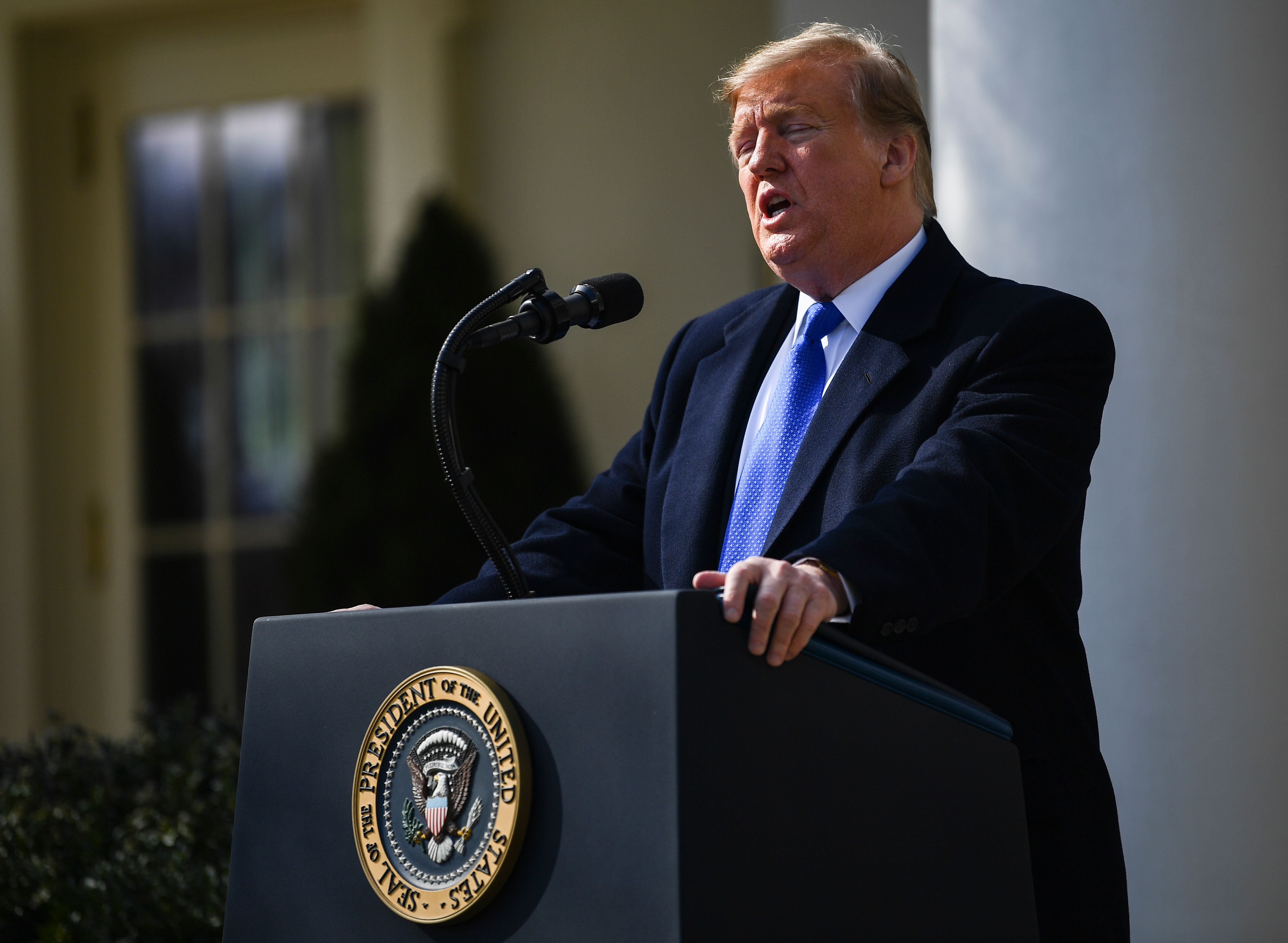 US President Donald Trump delivers remarks in the Rose Garden at the White House in Washington, DC on February 15, 2019. - President Donald Trump, repeating his claim that "walls work," announced that he will declare a national emergency in order to build a barrier on the US-Mexico border without funding from Congress. (Photo by BRENDAN SMIALOWSKI/AFP/Getty Images)