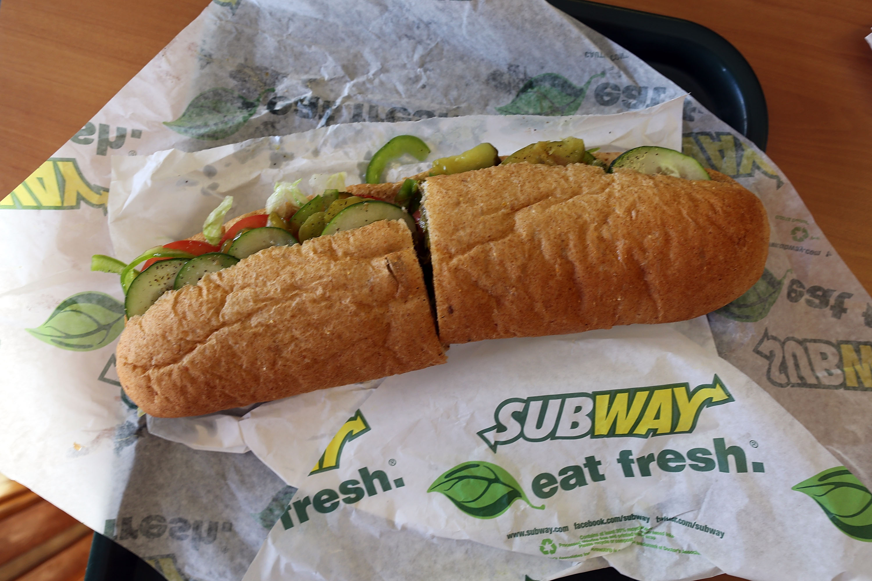 MIAMI, FL - OCTOBER 21: A Subway sandwich is seen in a restaurant as the company announced a settlement over a class-action lawsuit that alleged that Subway engaged in deceptive marketing for its 6-inch and 12-inch sandwiches and served customers less food than they were paying for on October 21, 2015 in Miami, Florida. (Joe Raedle/Getty Images)