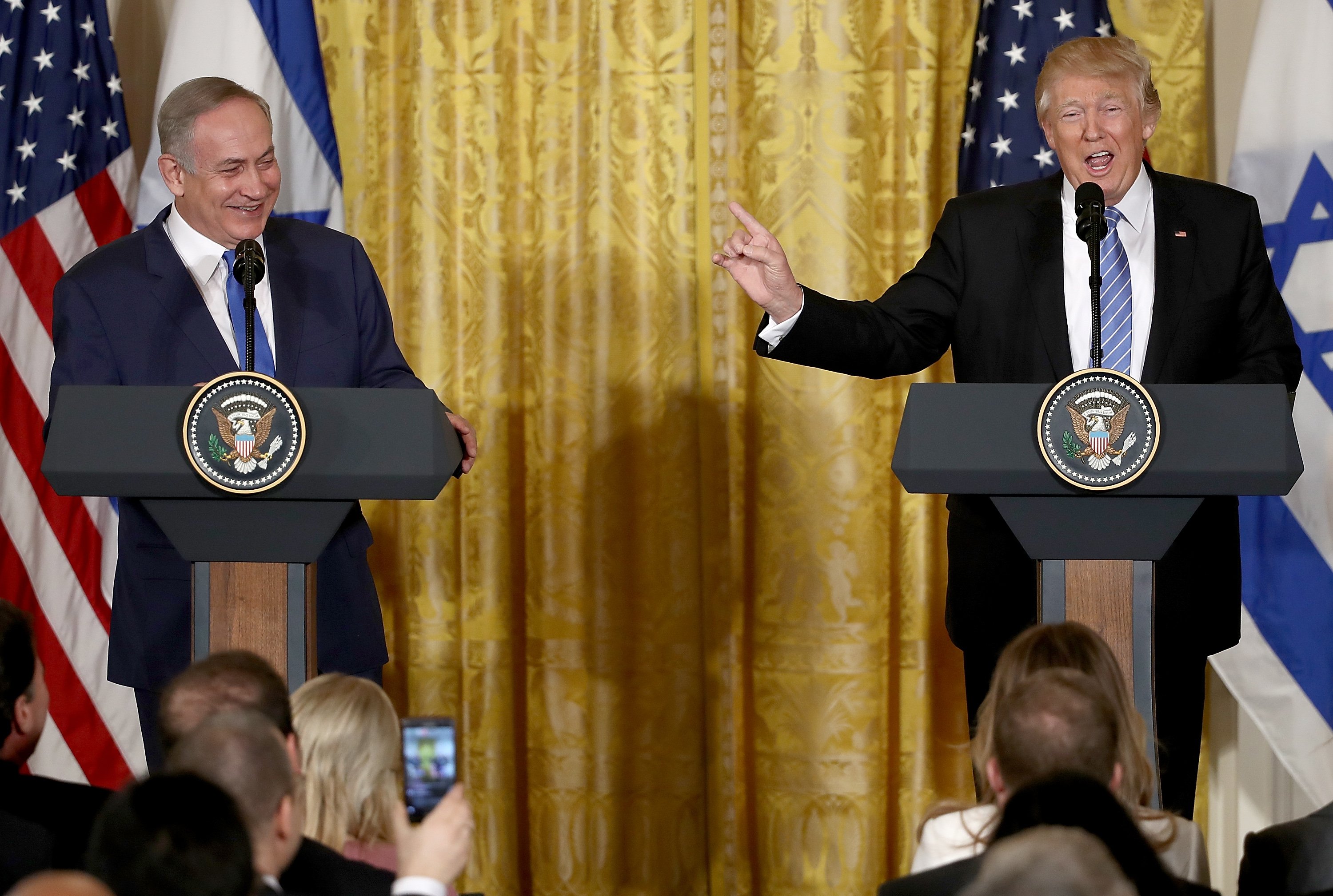 U.S. President Donald Trump (R) and Israel Prime Minister Benjamin Netanyahu (L) answer questions during a joint news conference in the East Room of the White House February 15, 2017 in Washington, DC ... (Photo by Win McNamee/Getty Images)