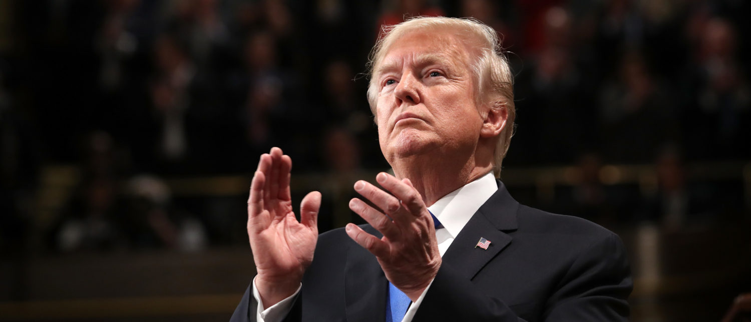 WASHINGTON, DC - JANUARY 30: U.S. President Donald J. Trump claps during the State of the Union address in the chamber of the U.S. House of Representatives January 30, 2018 in Washington, DC. This is the first State of the Union address given by U.S. President Donald Trump and his second joint-session address to Congress. (Photo by Win McNamee/Getty Images)