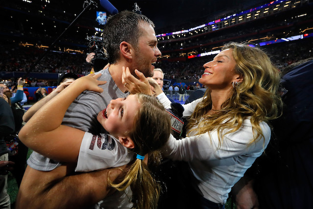 Tom Brady #12 of the New England Patriots celebrates with his wife Gisele Bündchen after the Super Bowl LIII against the Los Angeles Rams at Mercedes-Benz Stadium on February 3, 2019 in Atlanta, Georgia. The New England Patriots defeat the Los Angeles Rams 13-3. (Photo by Kevin C. Cox/Getty Images)