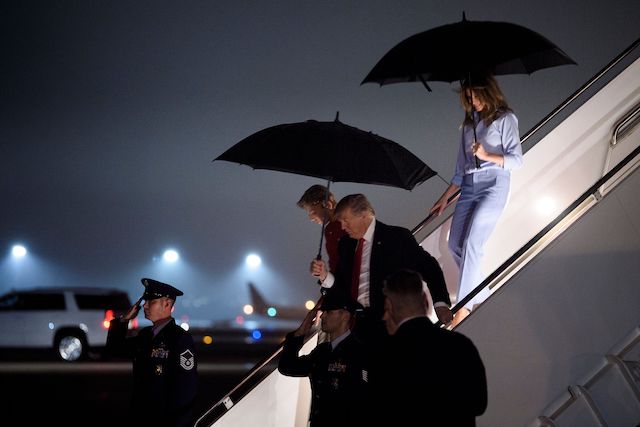 US President Donald Trump arrives with Barron Trump and US first lady Melania Trump at Palm Beach International Airport February 1, 2019 in Palm Beach, Florida. (Photo credit: BRENDAN SMIALOWSKI/AFP/Getty Images)