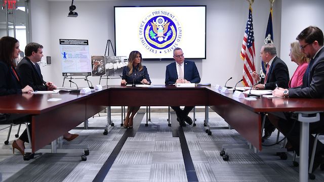 US First Lady Melania Trump (CL) takes part in a briefing at the Office of National Drug Control Policy with Director James Carroll (CR) in Washington, DC on February 7, 2019. (Photo credit: MANDEL NGAN/AFP/Getty Images)