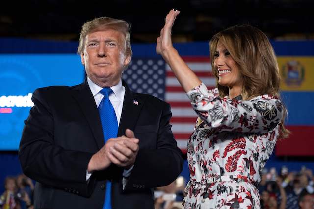 US President Donald Trump and First Lady Melania Trump deliver remarks to the Venezuelan American community at Florida International University Ocean Bank Convocation Center in Miami, FL, on February 18, 2019. (Photo credit: JIM WATSON/AFP/Getty Images)