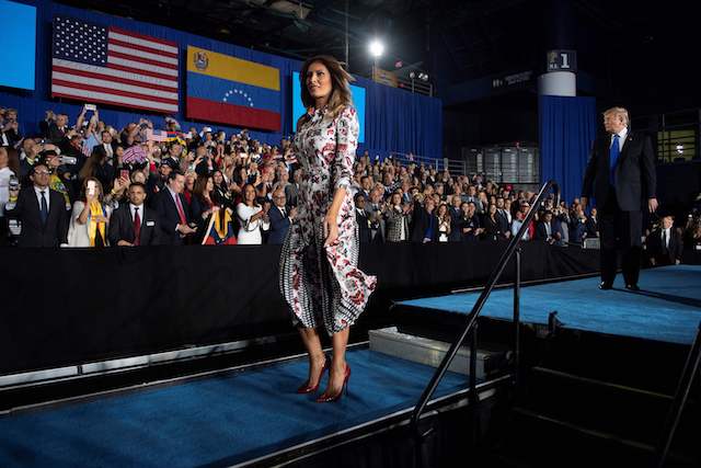 US President Donald Trump and First Lady Melania Trump arrive to deliver remarks to the Venezuelan American community at Florida International University Ocean Bank Convocation Center in Miami, FL, on February 18, 2019. (Photo credit: JIM WATSON/AFP/Getty Images)