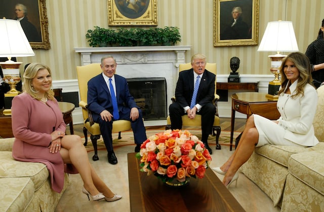 U.S. President Donald Trump (2ndR) and first lady Melania Trump meet Israeli Prime Minister Benjamin Netanyahu and his wife Sara (L) in the Oval Office of White House in Washington, U.S., February 15, 2017. REUTERS/Kevin Lamarque