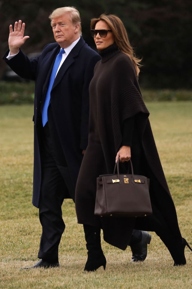 U.S. President Donald Trump and first lady Melania Trump walk towards the Marine One on the South Lawn of the White House prior to their departure on February 15, 2019 in Washington, DC. Earlier, President Trump declared a national emergency to build a wall on the border. He and the first lady are traveling to his Mar-a-Lago resort in Palm Beach, Florida for the weekend. (Photo by Alex Wong/Getty Images)