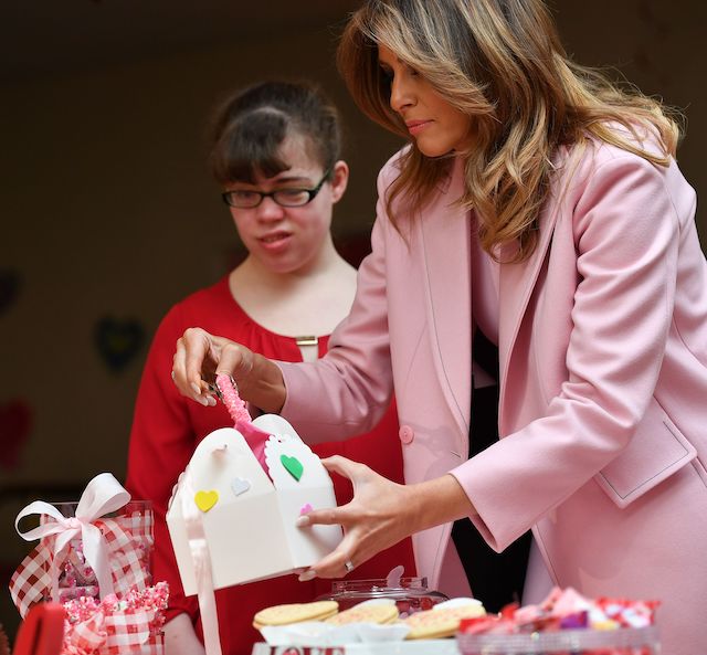 US First Lady Melania Trump visits children to celebrate Valentine's Day at the Children's Inn at the National Institute of Health (NIH) in Bethesda, Maryland, on February 14, 2019. - The Children's Inn at NIH serves as a home for children undergoing medical treatment and their families. (Photo credit: MANDEL NGAN/AFP/Getty Images)