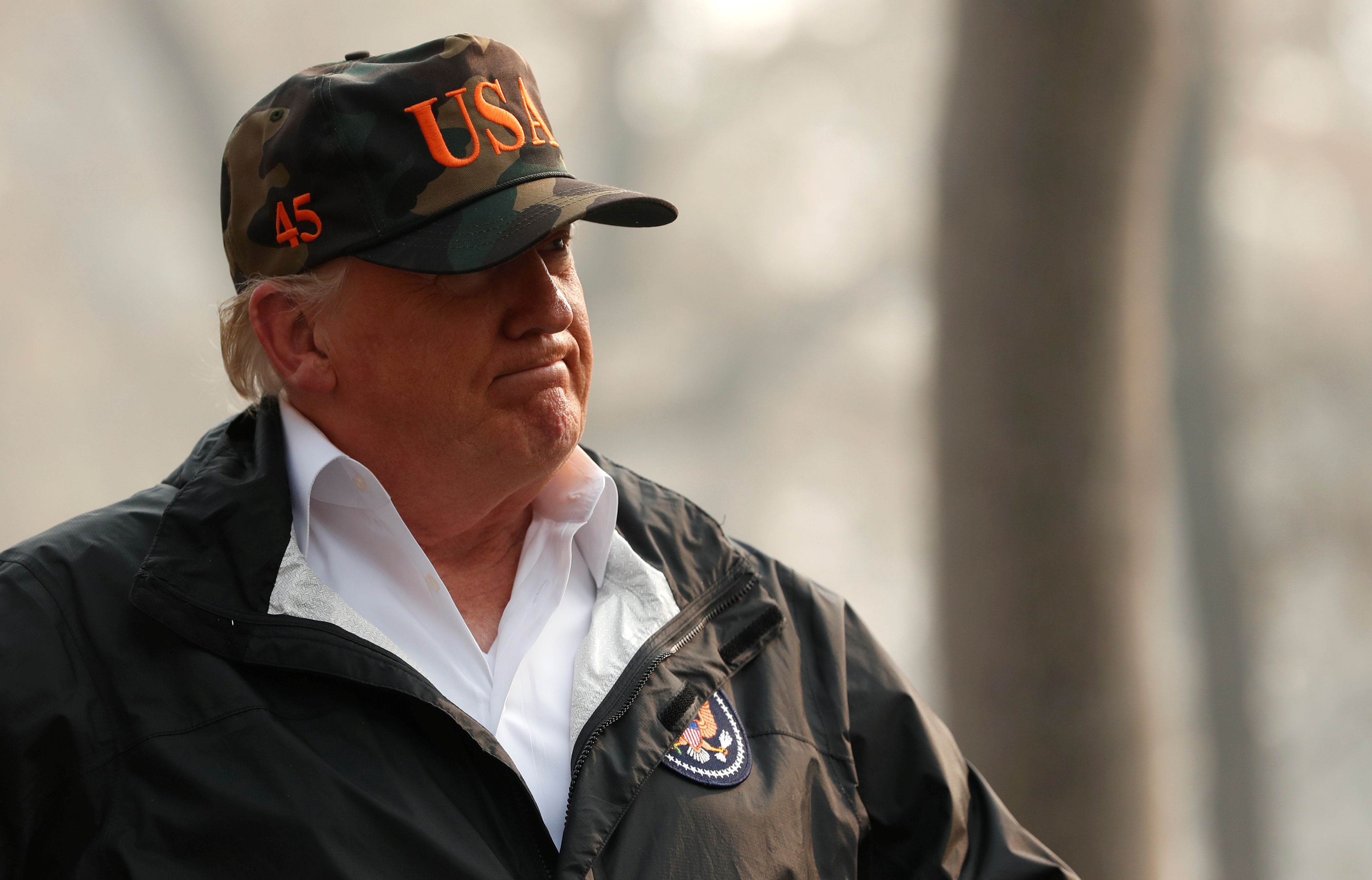 U.S. President Donald Trump visits a neighborhood recently destroyed by the Camp Fire in Paradise, California, U.S.