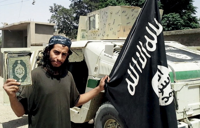 An undated photograph of a man described as Abdelhamid Abaaoud that was published in the Islamic State's online magazine Dabiq and posted on a social media website. REUTERS/Social Media Website via Reuters