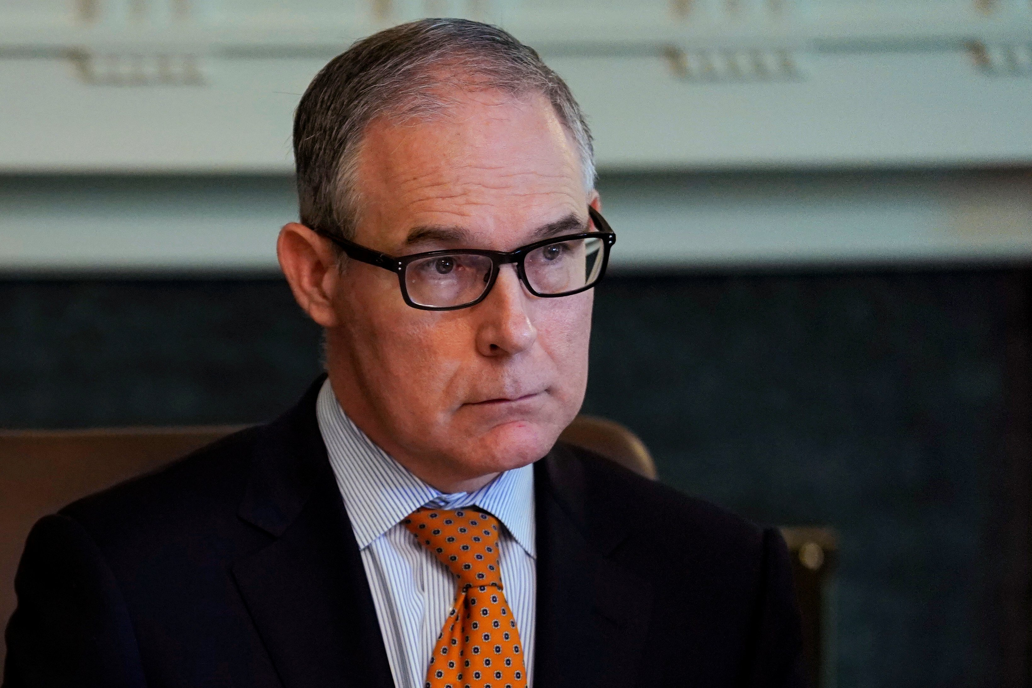 EPA Administrator Scott Pruitt listens during cabinet meeting at the White House in Washington
