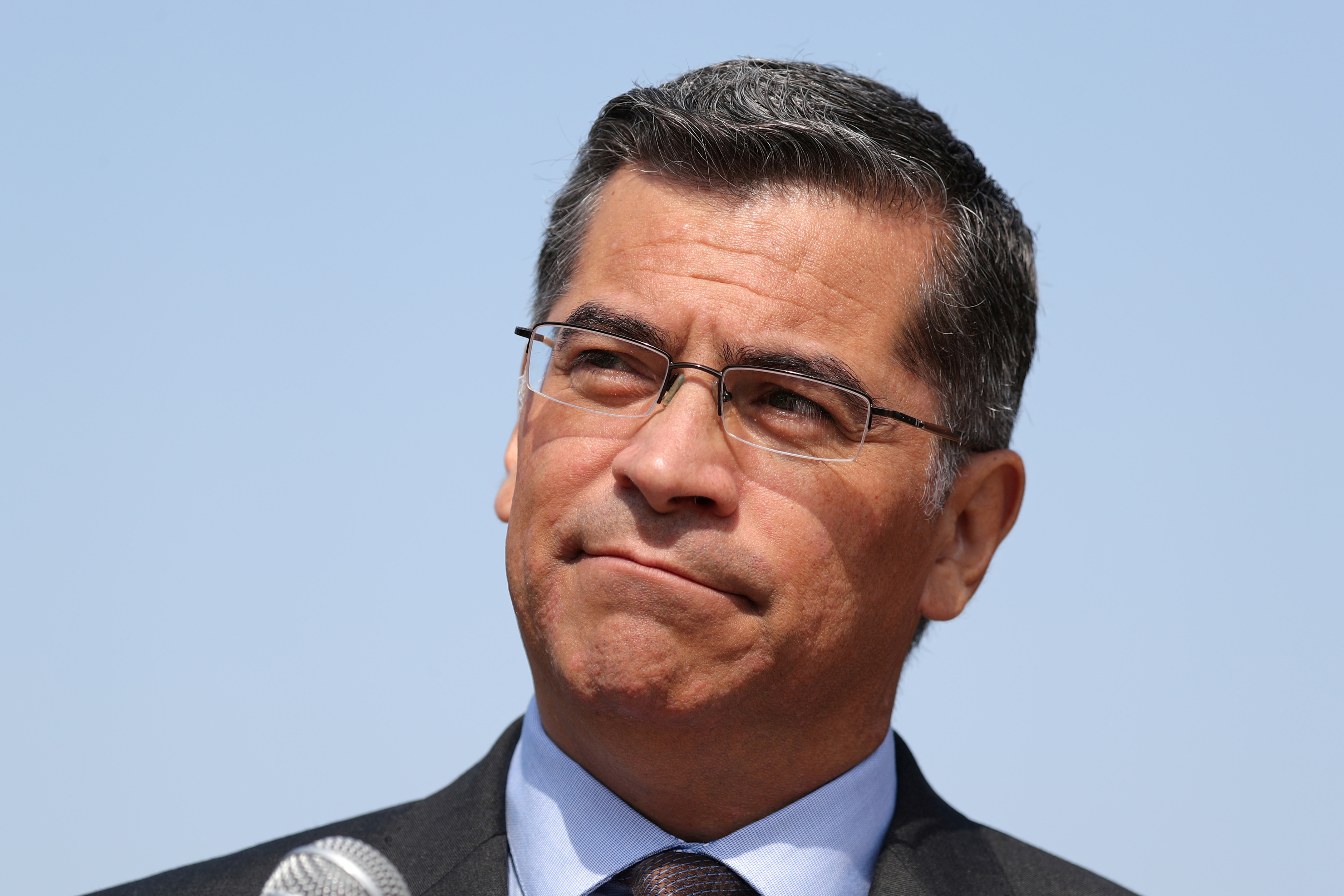 California Attorney General Xavier Becerra speaks about President Trump's proposal to weaken national greenhouse gas emission and fuel efficiency regulations, at a media conference in Los Angeles
