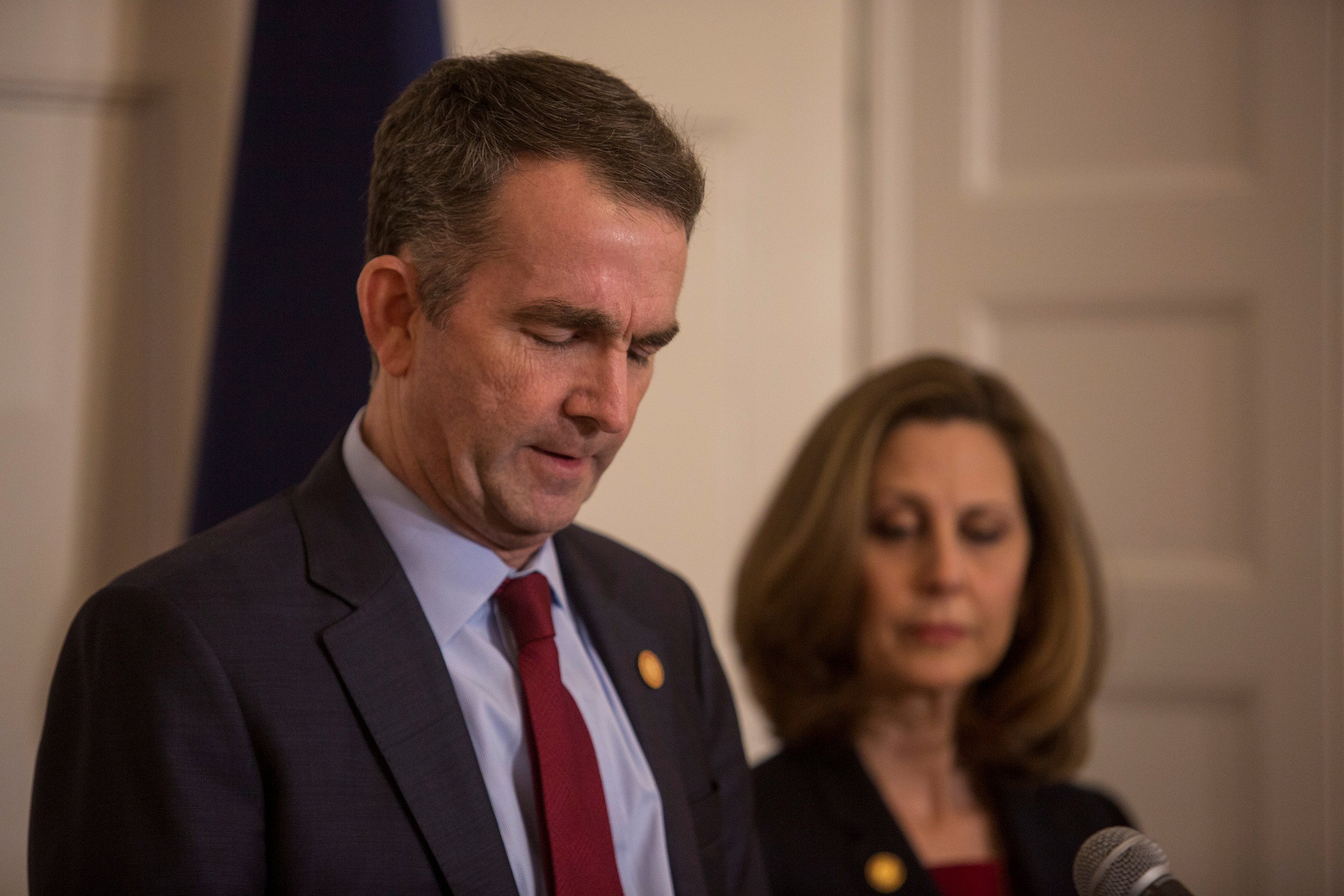 Virginia Governor Ralph Northam, accompanied by his wife Pamela Northam announces he will not resign during a news conference in Richmond, Virginia, U.S. February 2, 2019. Picture taken February 2, 2019. REUTERS/ Jay Paul