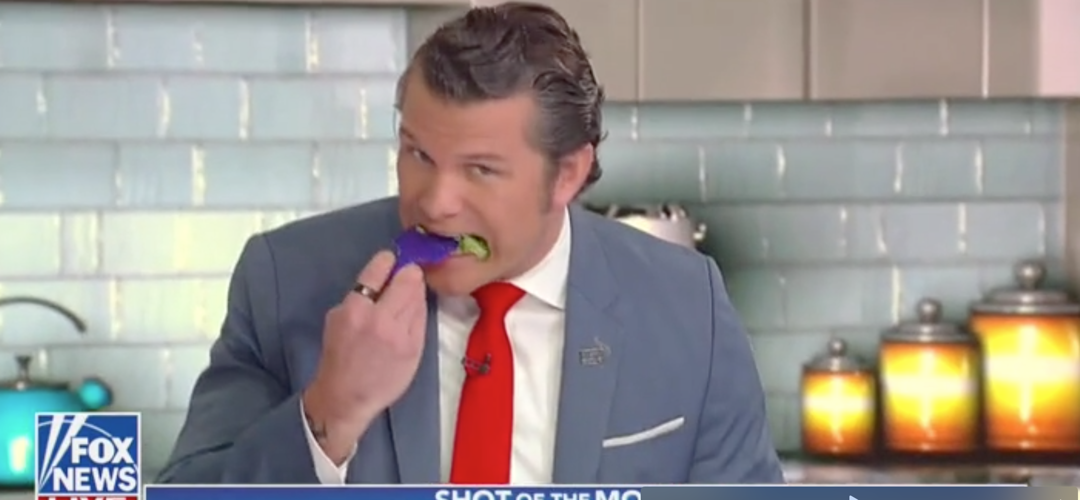 Pete Hegseth eats salad with a comb on "Fox & Friends." Screen Shot/Fox News