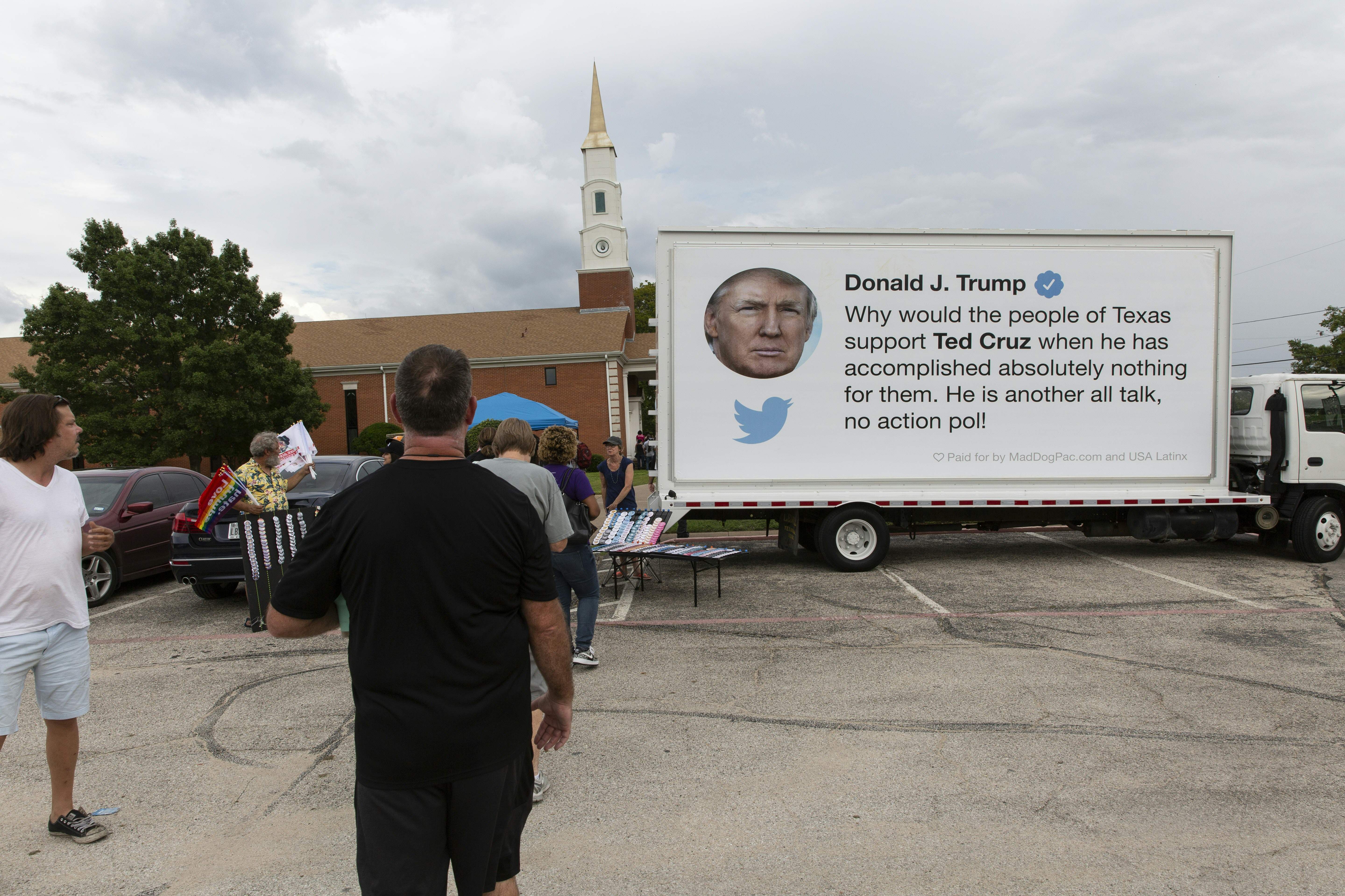 A billboard of a tweet by Pres. Donald Trump criticizing Sen. Ted Cruz stands outside a rally for U.S. Representative Beto O'Rourke (D-TX) in Dallas, Texas, on Sep. 14, 2018. - O'Rourke is the Democratic challenger for the U.S. Senate seat currently held by U.S. Senator Ted Cruz (R-TX) (Photo by Laura Buckman / Laura Buckman/AFP / AFP) (Photo credit should read LAURA BUCKMAN/AFP/Getty Images)
