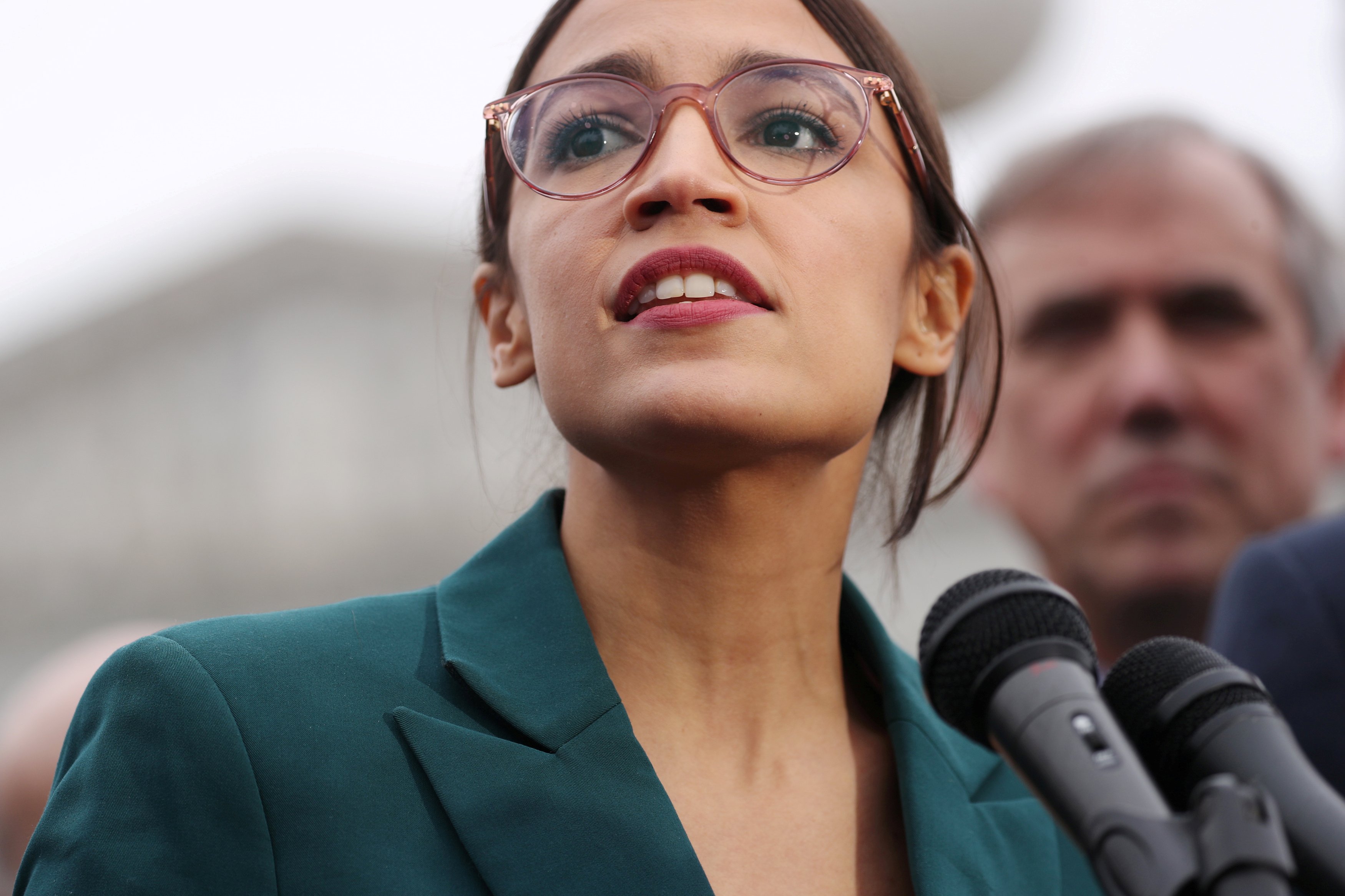 U.S. Representative Alexandria Ocasio-Cortez (D-NY) speaks during a news conference for a proposed "Green New Deal" to achieve net-zero greenhouse gas emissions in 10 years, at the U.S. Capitol in Washington, U.S. February 7, 2019. REUTERS/Jonathan Ernst/File Photo