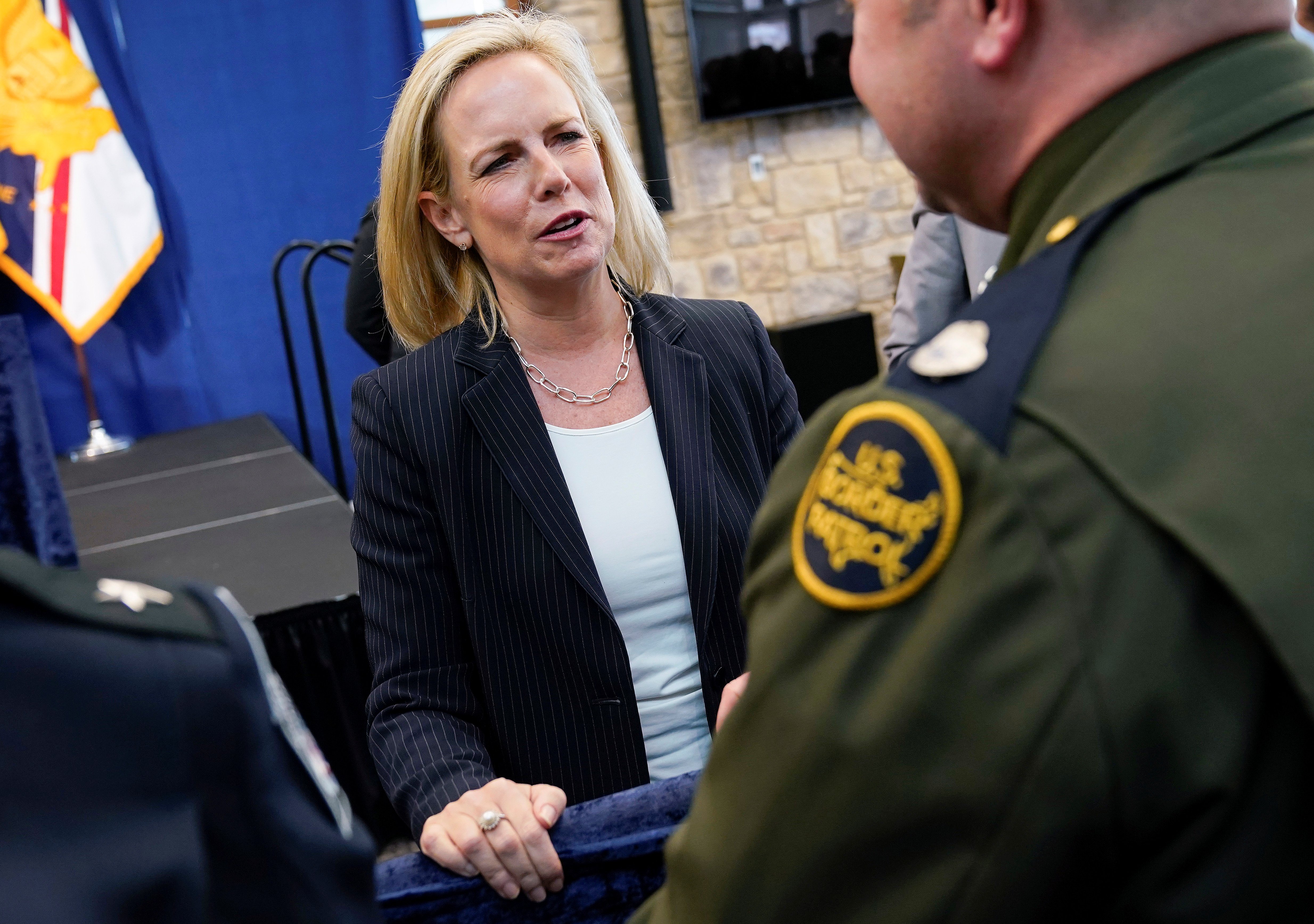 U.S. Secretary of Homeland Security Kirstjen Nielsen greets a member of the U.S. Border Patrol at the U.S. Customs and Border Protection Advanced Training Facility in Harpers Ferry, West Virginia, U.S., March 13, 2019. REUTERS/Joshua Roberts 
