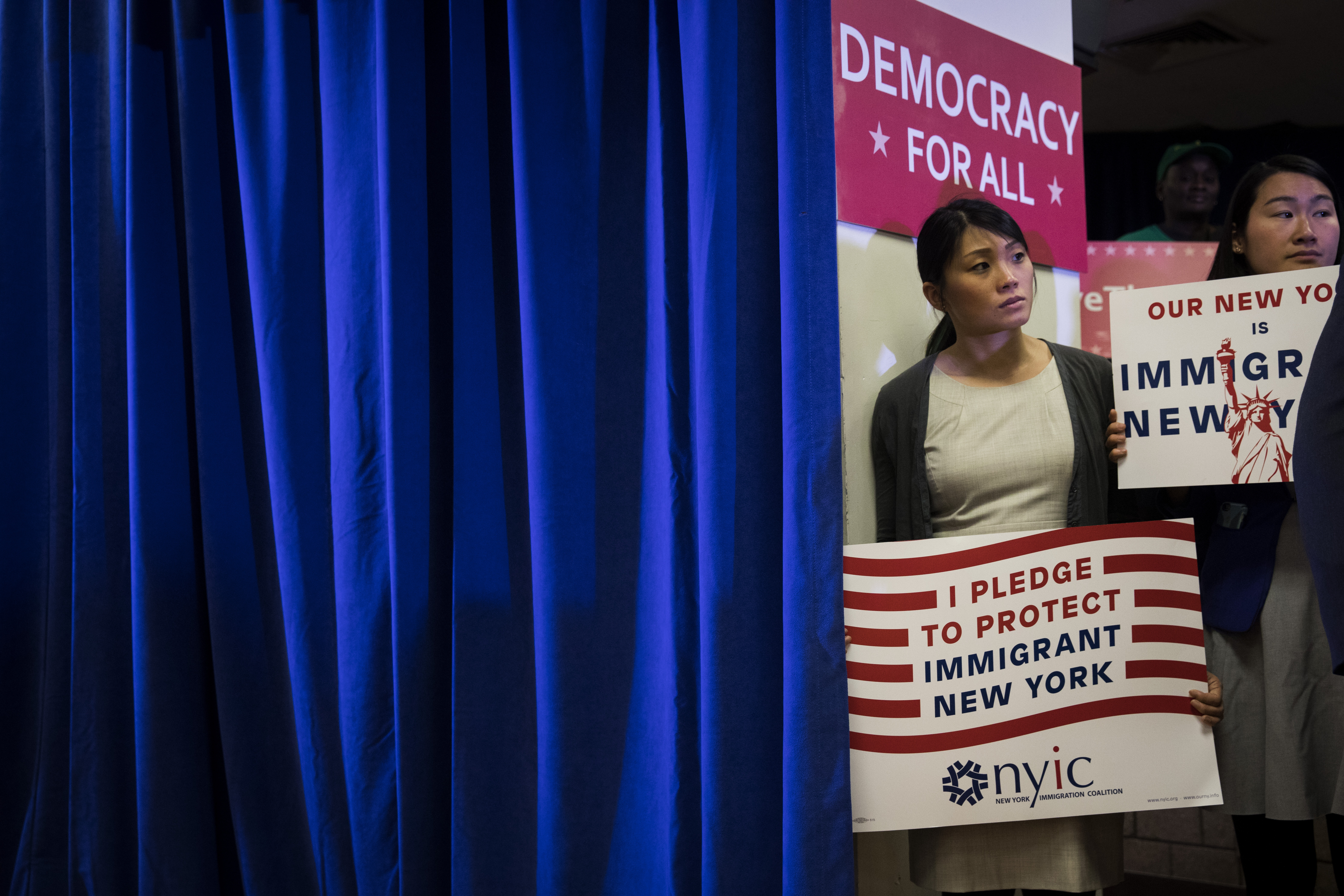NEW YORK, NY - APRIL 3: Activists look on during a press conference to announce a multi-state lawsuit to block the Trump administration from adding a question about citizenship to the 2020 Census form, at the headquarters of District Council 37, New York City's largest public employee union, April 3, 2018 in New York City. (Photo by Drew Angerer/Getty Images)