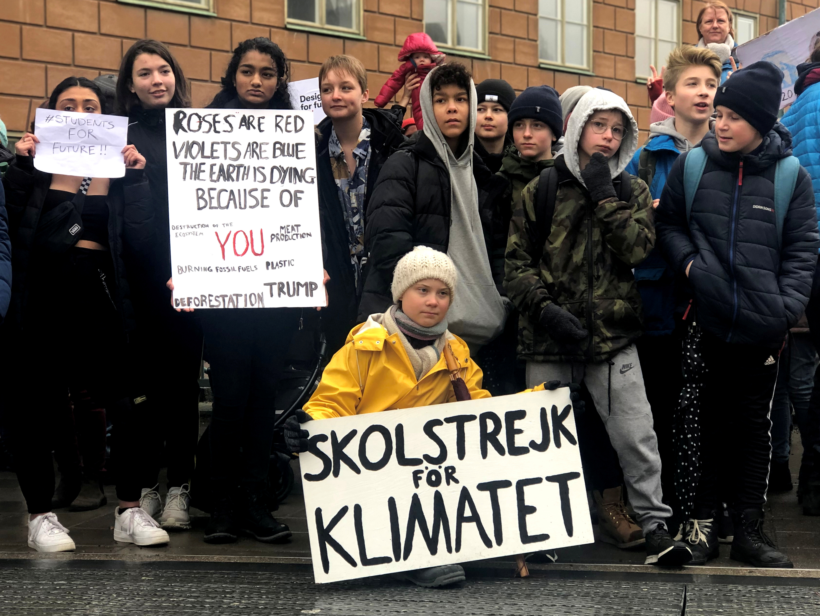 Swedish 16-year-old environmental activist Greta Thunberg attends a protest next to Sweden's parliament in Stockholm