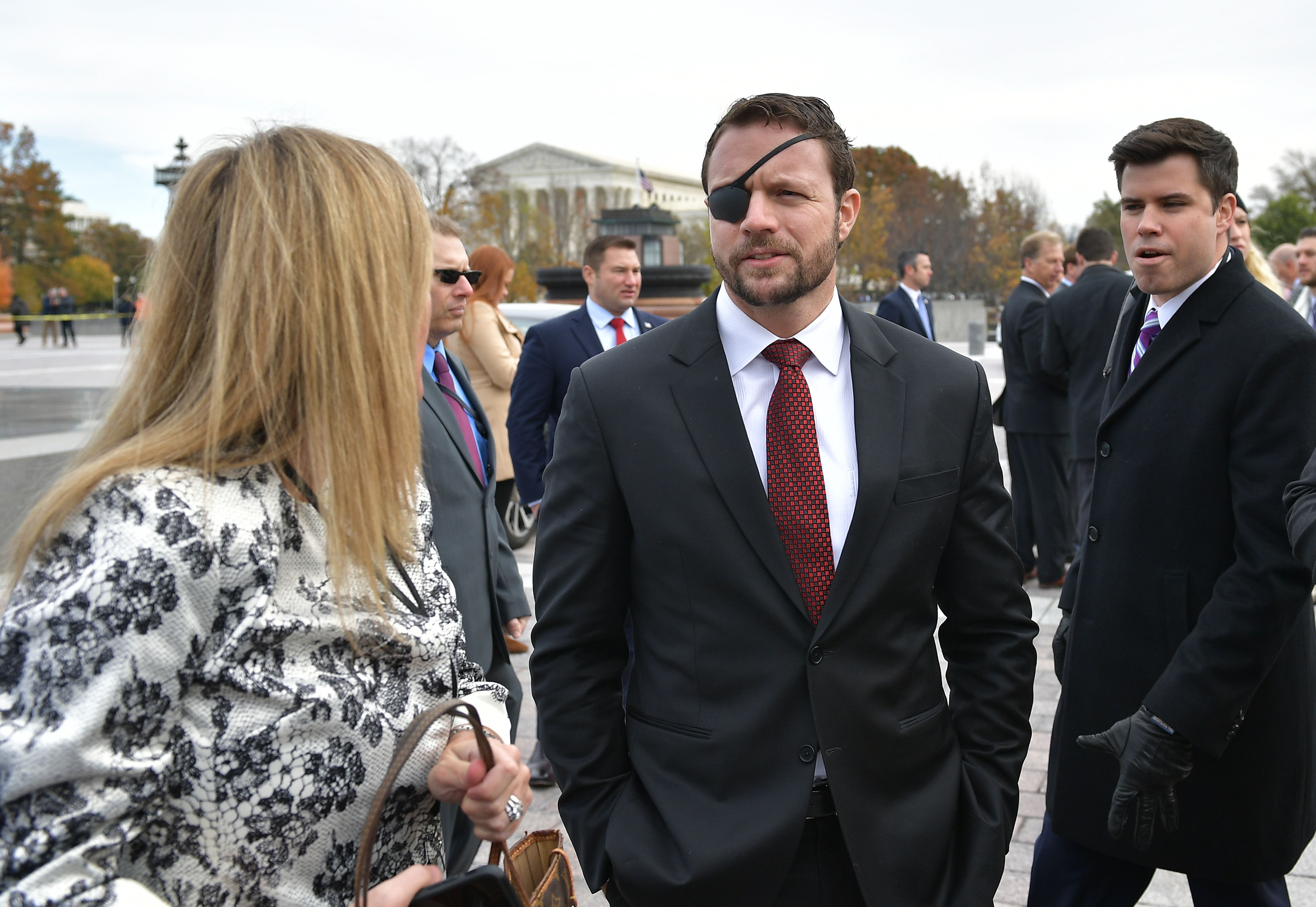 Republican House member-elect Dan Crenshaw is seen after posing for the 116th Congress members-elect group photo on the East Front Plaza of the US Capitol in Washington, DC on November 14, 2018. (Photo by MANDEL NGAN / AFP) (Photo credit should read MANDEL NGAN/AFP/Getty Images)