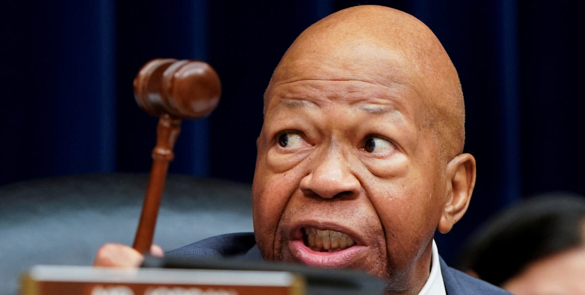 House Oversight Committee Chairman Cummings waves his gavel during Michael Cohen hearing on Capitol Hill in Washington