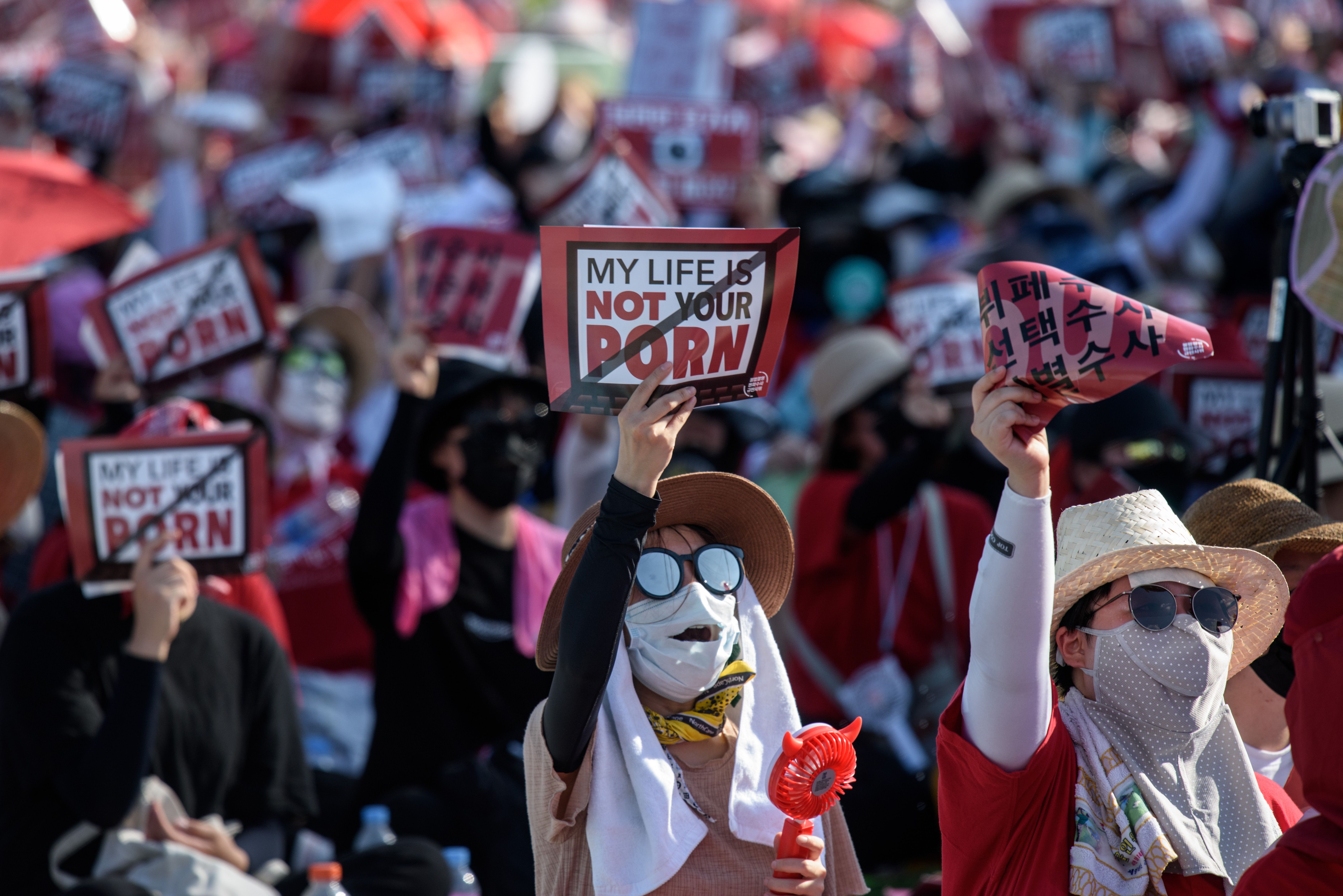 Female protesters shout slogans during a rally against 'spy-cam porn' in central Seoul on August 4, 2018. (ED JONES/AFP/Getty Images)