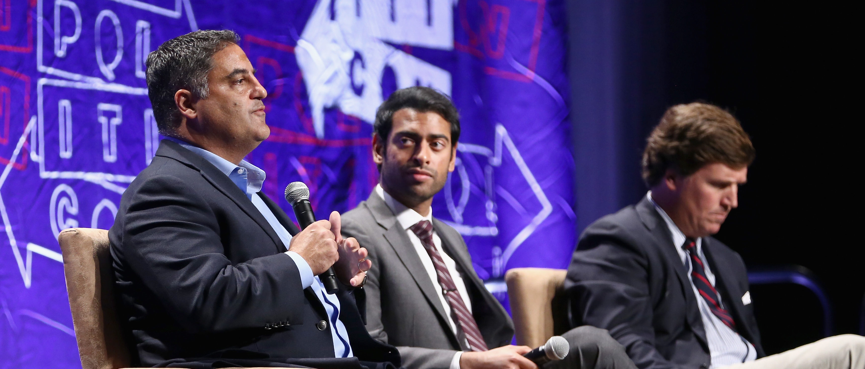 LOS ANGELES, CA - OCTOBER 21: (L-R) Cenk Uygur, Steven Olikara, and Tucker Carlson during Politicon 2018 (Photo by Rich Polk/Getty Images for Politicon )